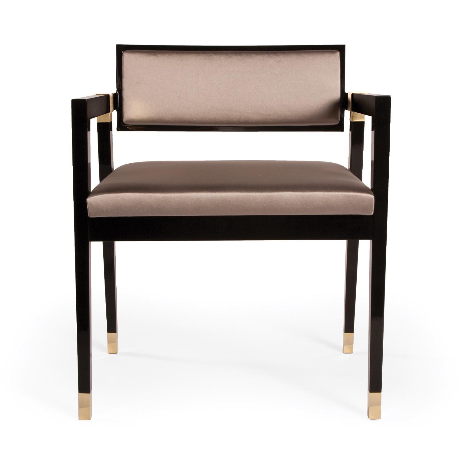 The decadent pascal chair with nostalgic elements of the Art Deco era; a beguiling experience of comfort and luxury. The upholstery can be made with a selection of exquisite fabrics, combined with the beautiful base and legs crafted of smooth black