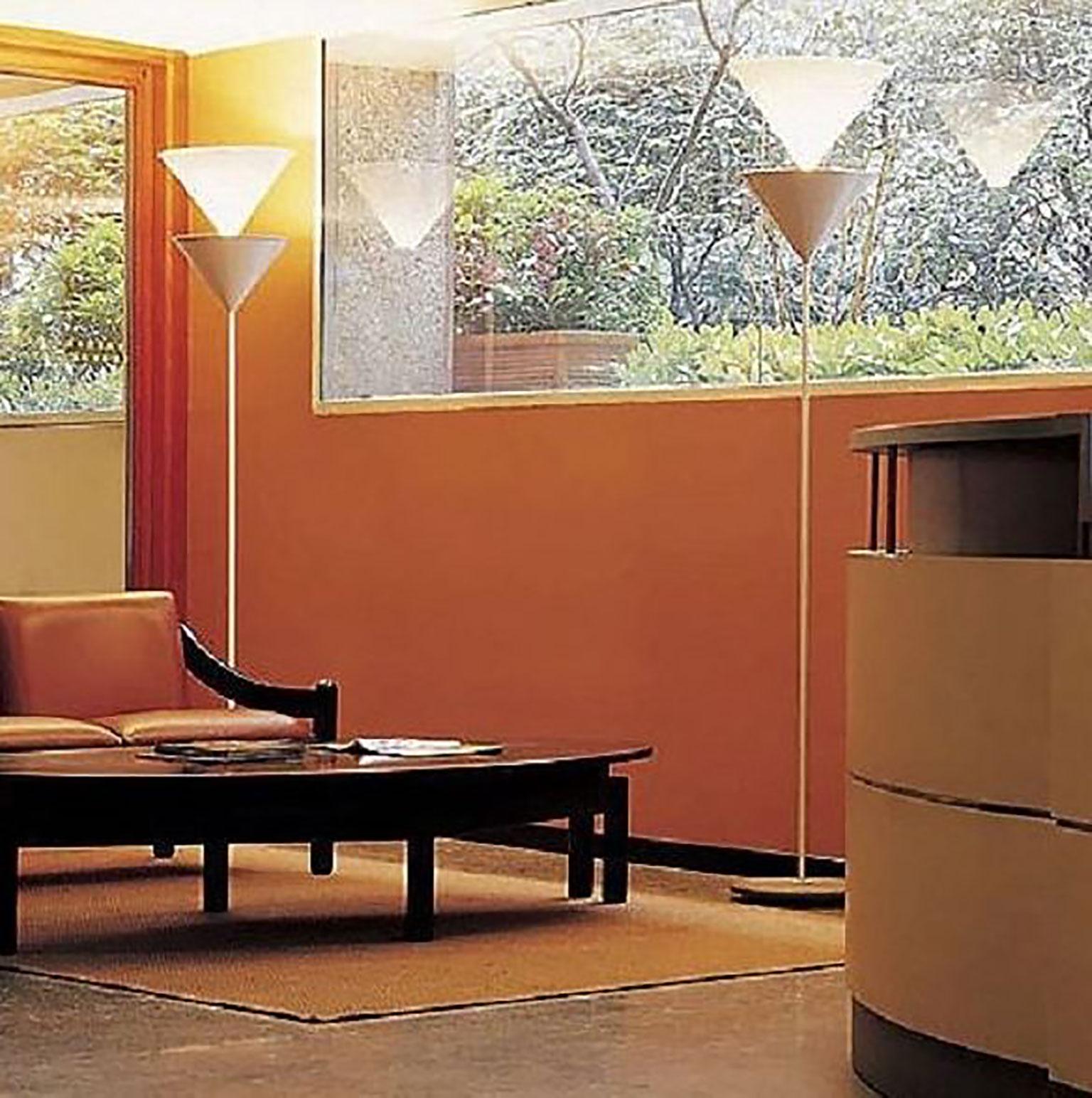 Pascal floor lamp by Vico Magistretti for Oluce. Vico Magistretti was an icon of mid-20th century design. During his career, he won the prestigious Compasso d'Oro numerous times. The Pascal Floor lamp is a classic fixture that supplements a wide