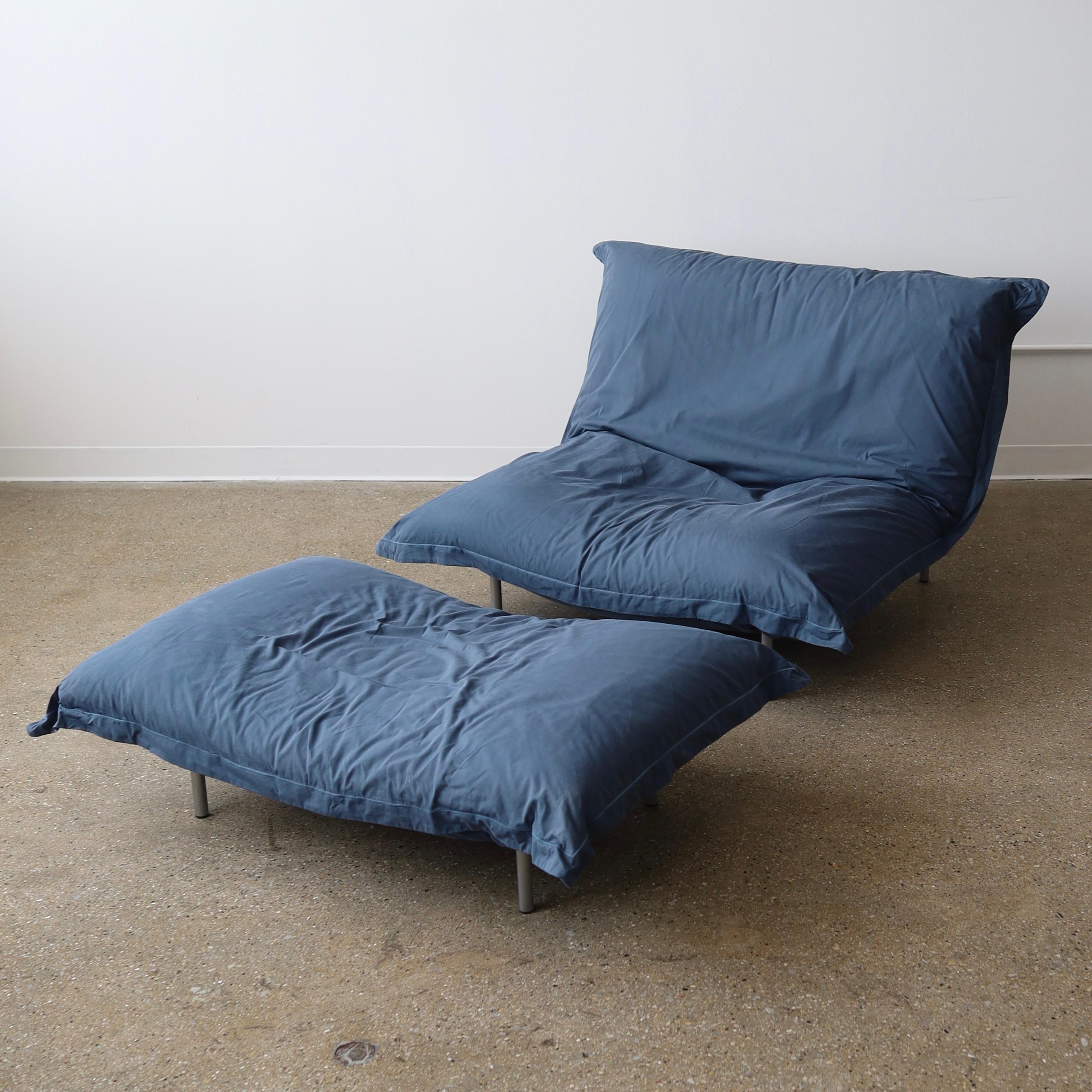 c. 1990s for Ligne Roset, professionally steam-cleaned. It features a reclinable back. There is wear on this piece including water stains, blotches, and sun fading. It has been priced accordingly. Reupholstery is available for a fee but this chair