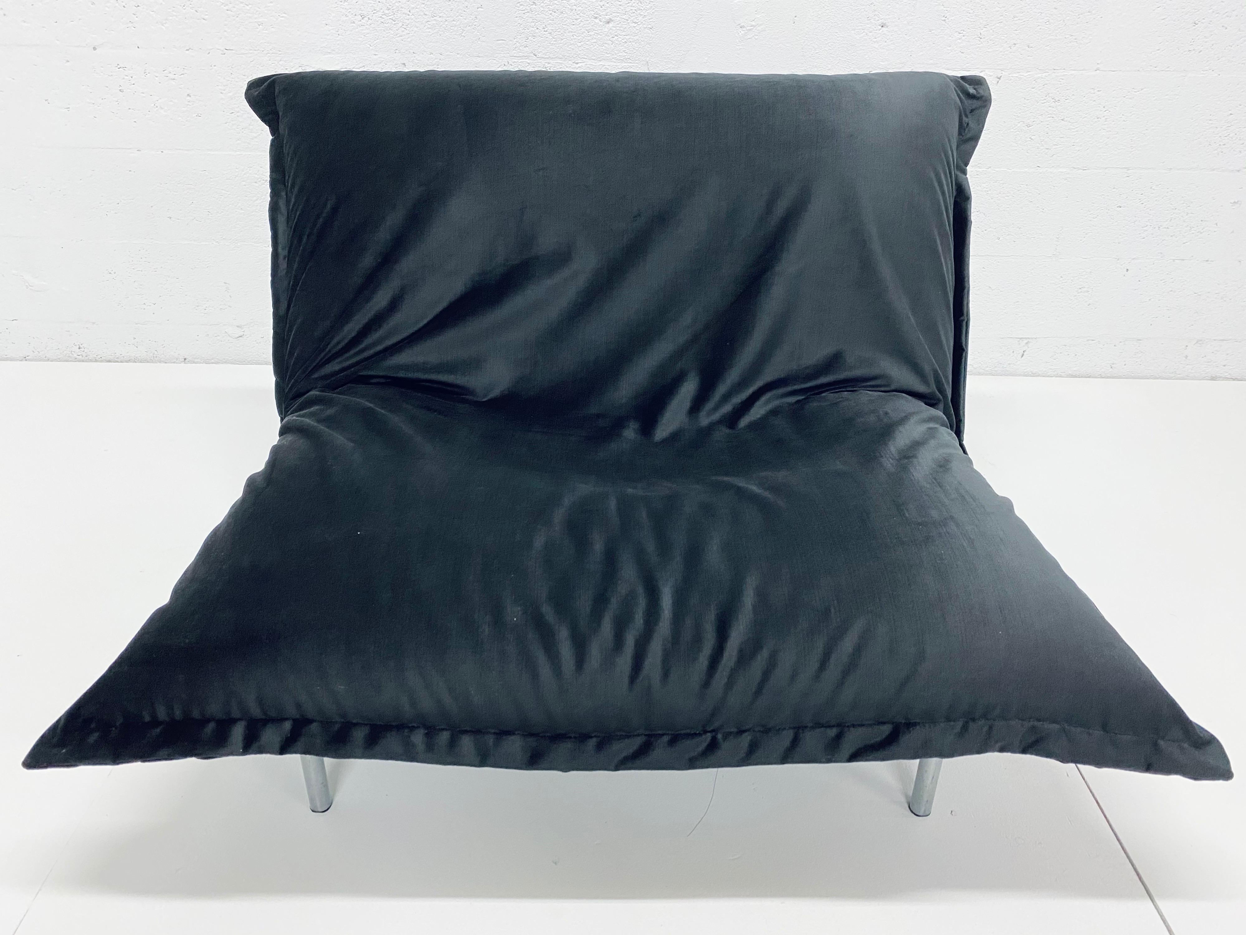 Calin Fireside pillow chair with recently reupholstered removable black velvet over foam with steel frame by Pascal Mourgue for Ligne Roset. The Calin chair's back is adjustable to three levels of comfort.

Calin is like a giant pillow: soft, yet