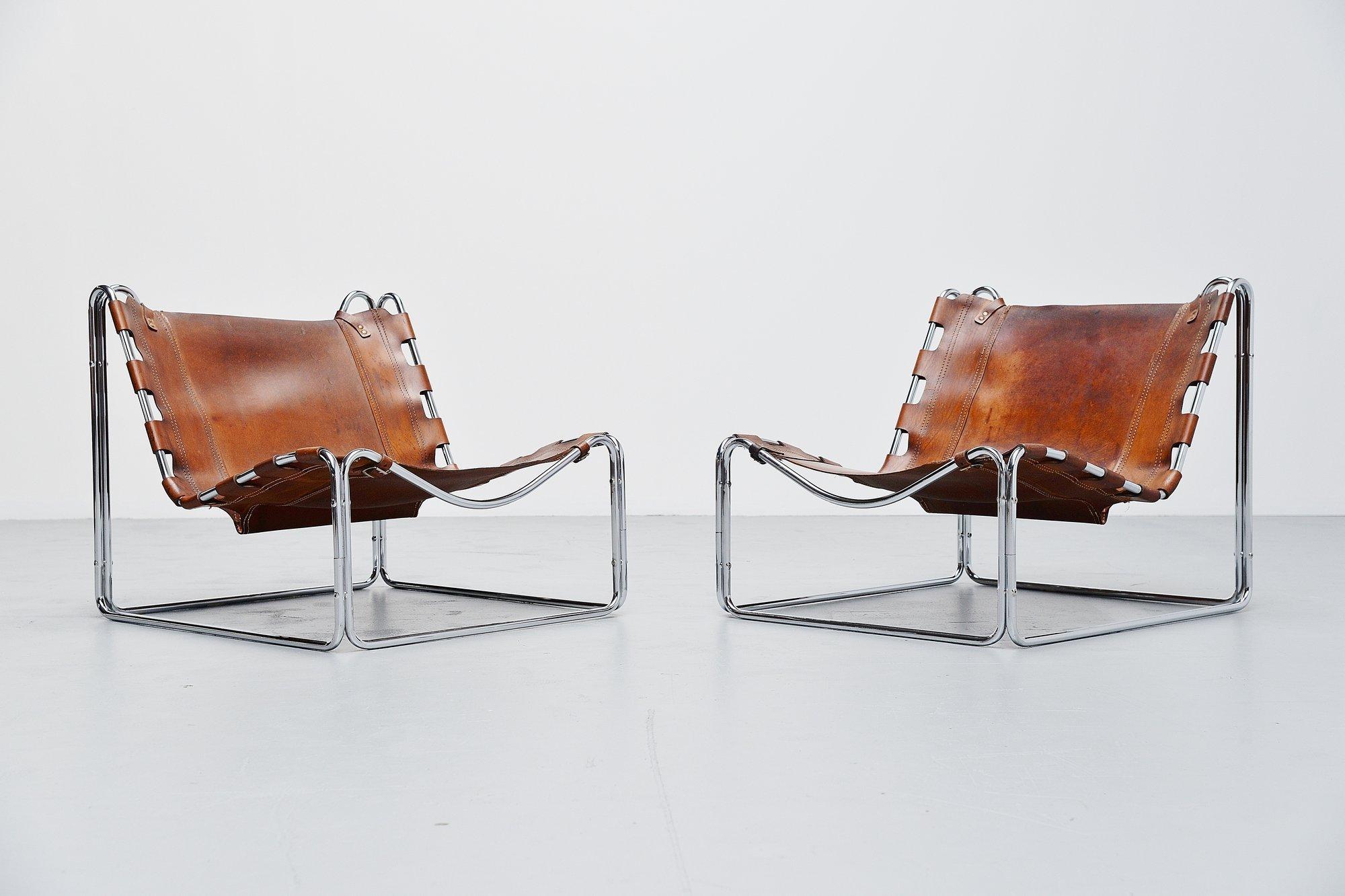 Ultra rare so called 'Fabio' lounge chair pair by Pascal Mourgue and manufactured by Sedia-Steiner, France 1970. This very nice low lounge chair pair is made of chrome plated tubular metal has an amazing shape! The nicely patinated natural leather