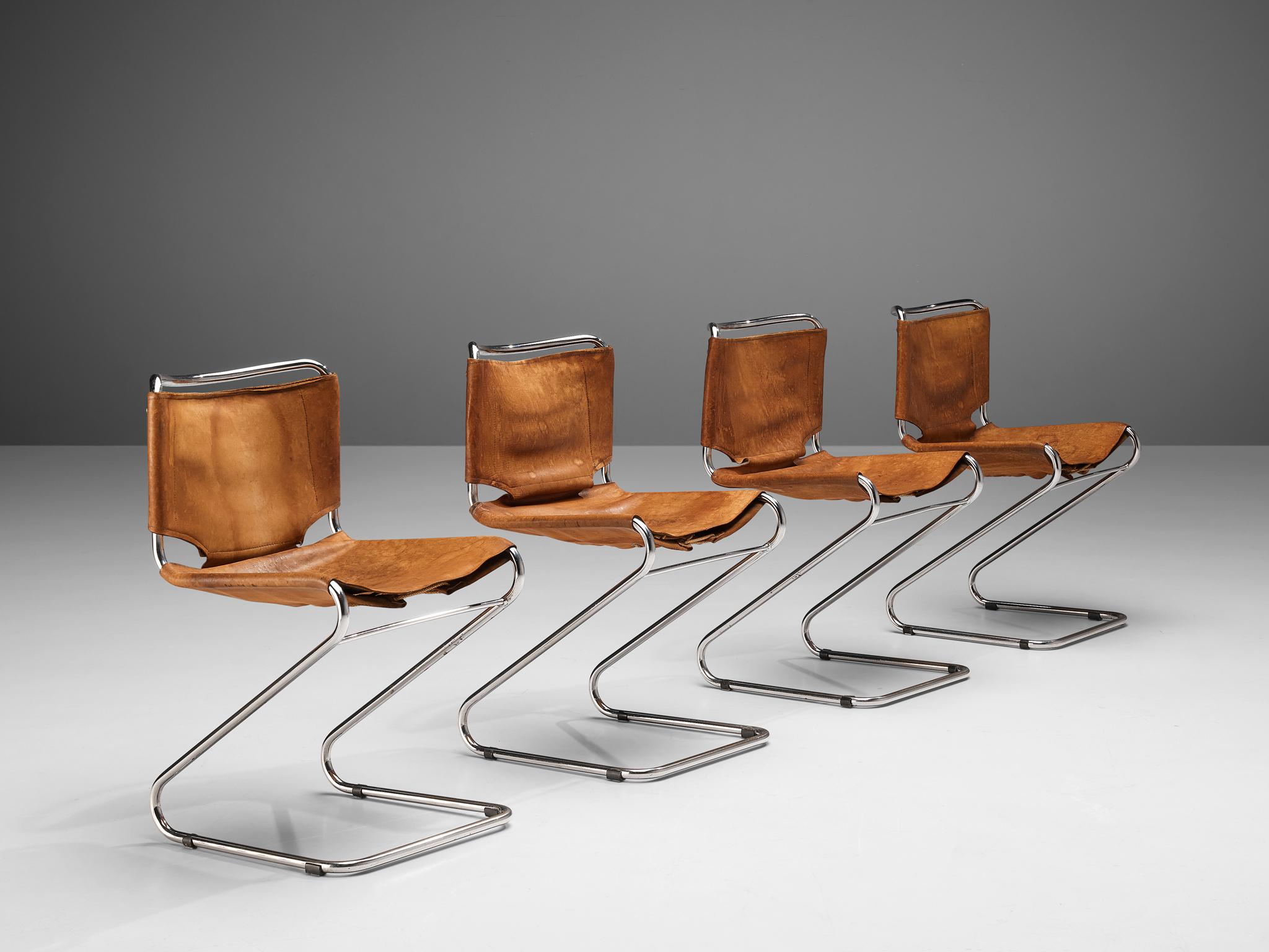 Pascal Mourgue for Steiner, set of 4 'Biscia' dining chairs, steel, cognac leather, France, 1960s.

Set of four 'Biscia' cantilever chairs in patinated cognac leather designed by Pascal Mourgue. These chairs have a very dynamic appearance due their