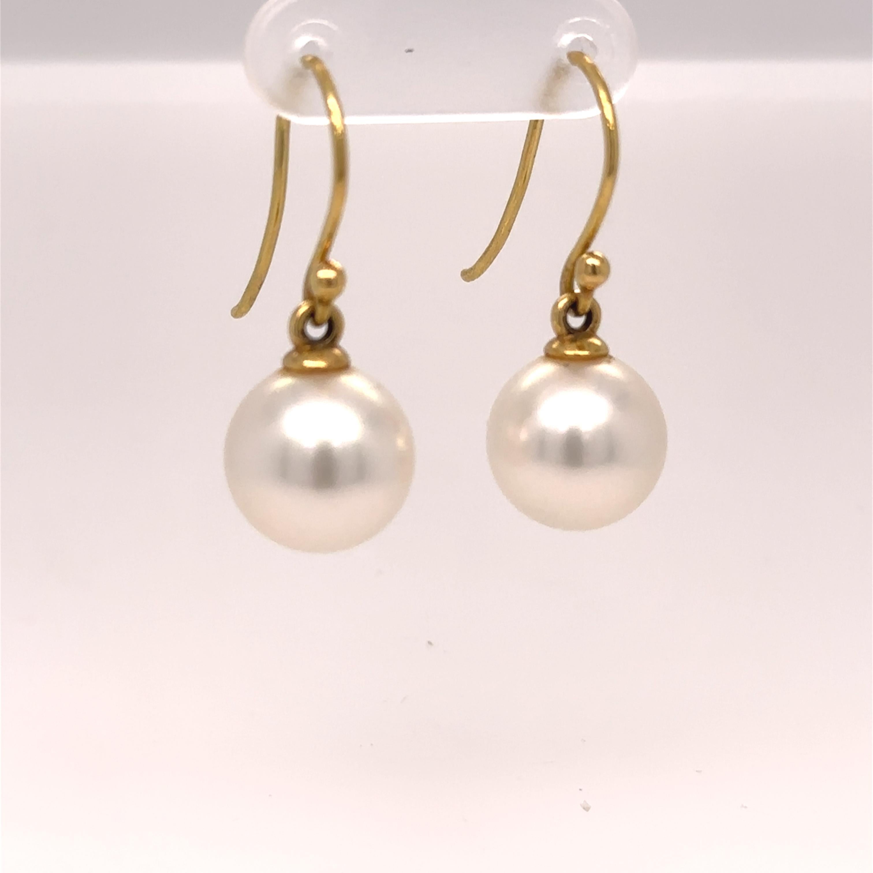 A Pair of Paspaley Shepherd Hook Earrings, made of 18ct Yellow Gold. Featuring 2 x Keel Edge Shepherd Hook earrings, near round Australian South Sea Pearls 11mm each. 

Metal: 18ct Yellow Gold
Carat: N/A
Colour: N/A
Clarity:  N/A
Cut: Near