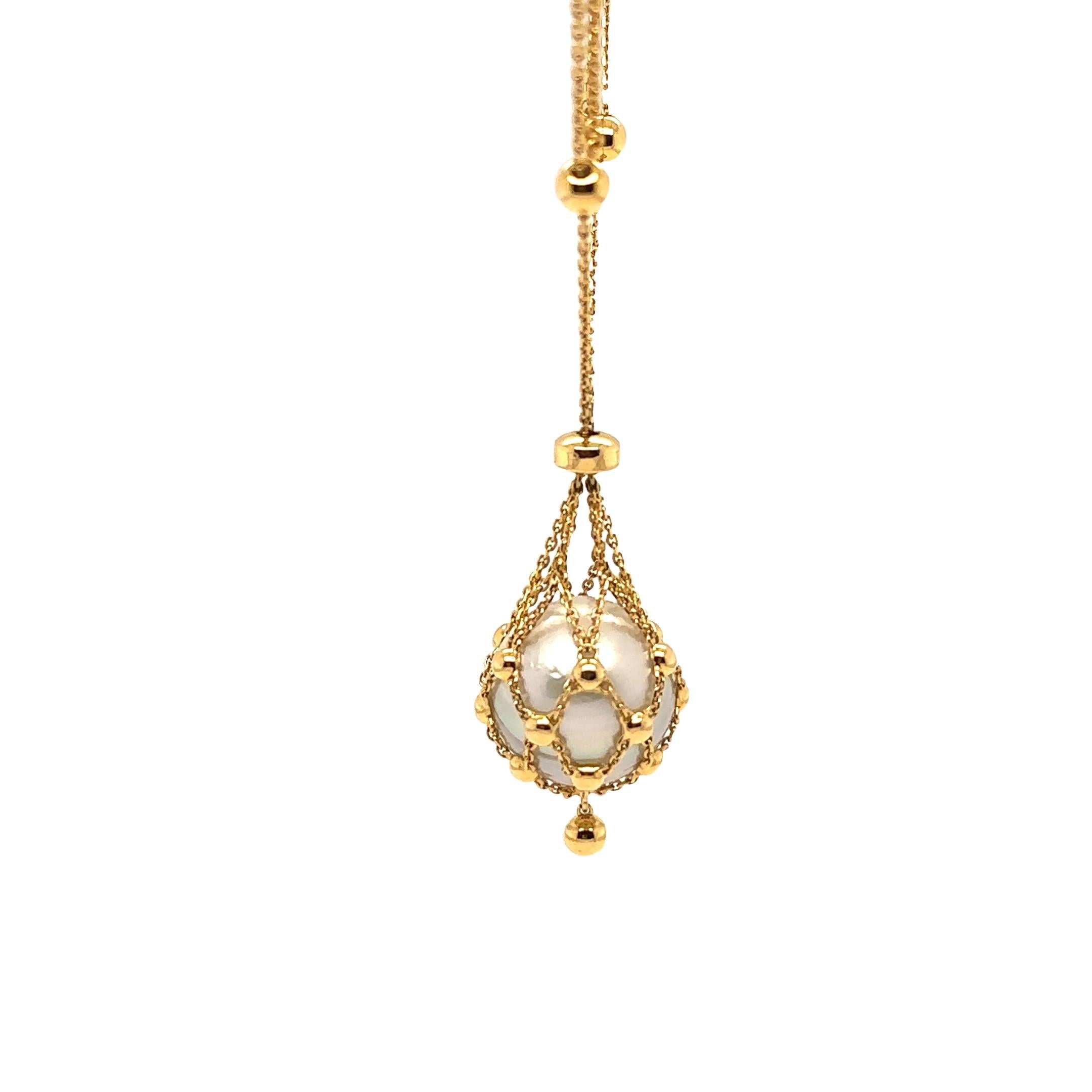 Paspaley Lavalier necklace. Made of 18ct Yellow Gold, length adjustable 40-73 cm, and weighing 14.4 gm.

Featuring a loose 15 mm South Sea Round Pearl.

The clasp is set with 12 round, brilliant cut Diamonds, colour F and clarity VS. with a total