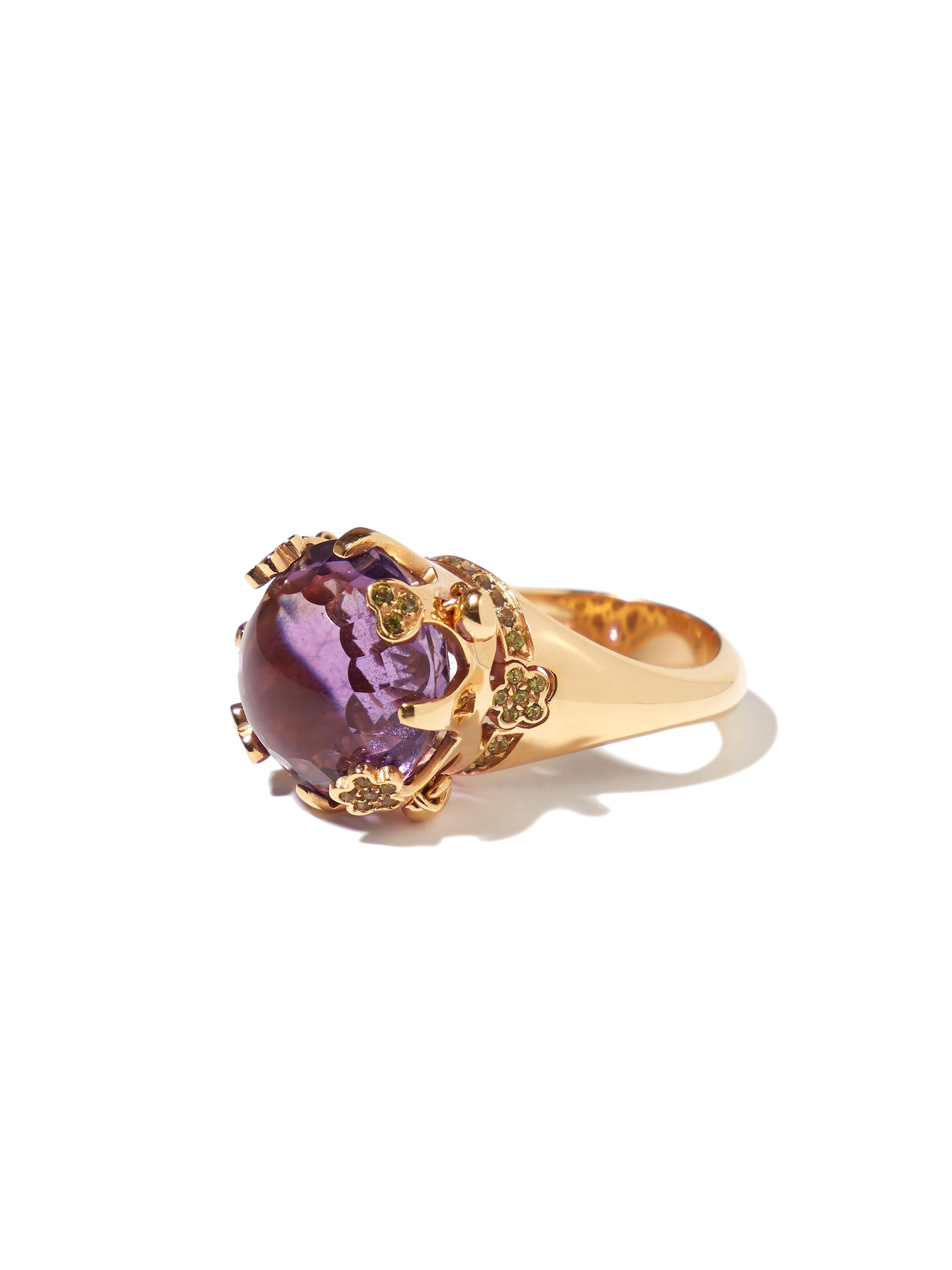 A gem of fascinating size, spellbinding nuance and captivating depth, the majestic amethyst weighing 15.98 carat graces this exceptional 18 karat rose gold ring from Pasquale Bruni with magnificent aesthetic appeal in combination with details of
