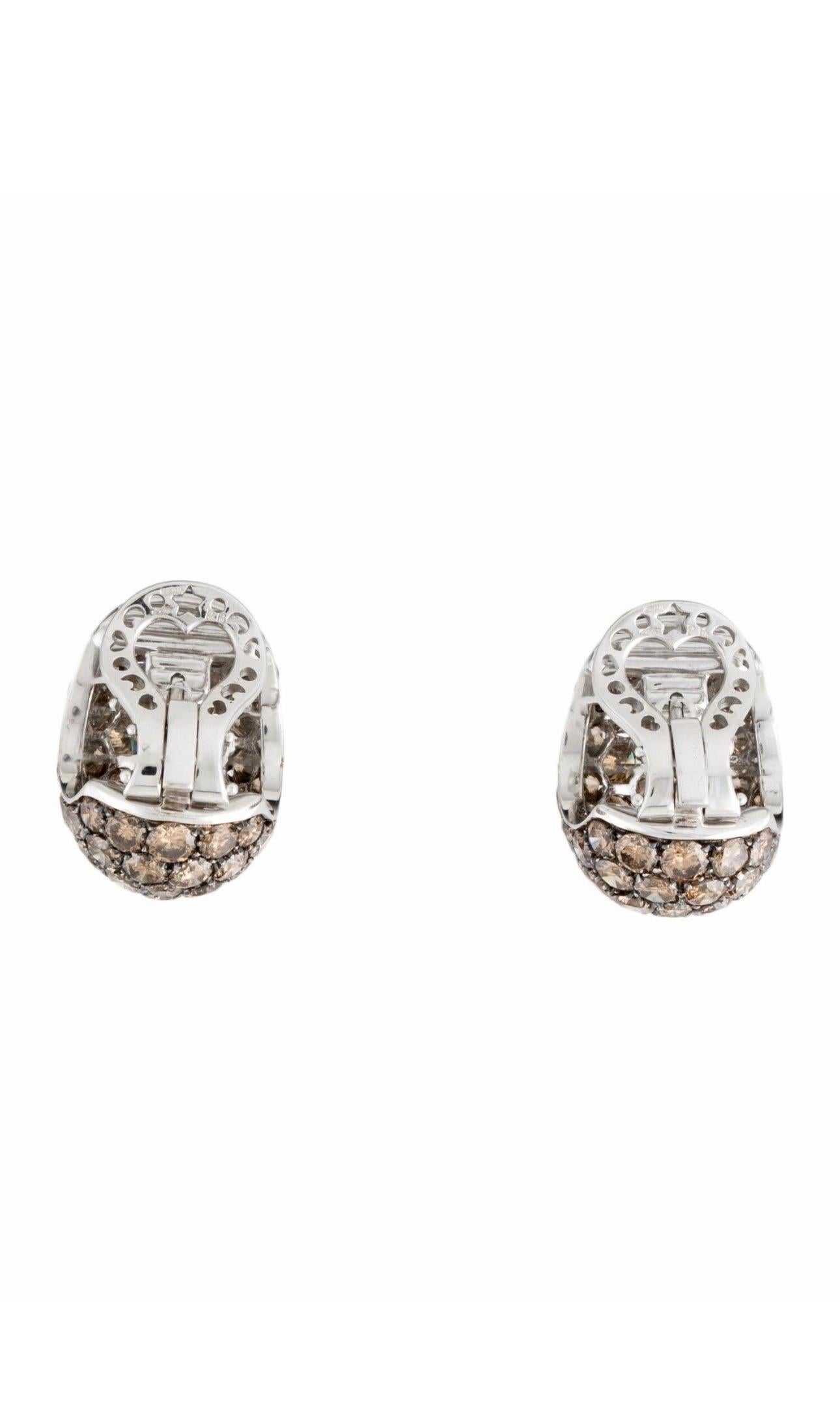 Metal Type: Rhodium-Plated 18K White Gold
Marks: 750, Designer Signature, Registered Trademark Number
Signature: PB *1940 MI
Total Item Weight (g): 20.0
Collateral: Laboratory Report, Jewelry Pouch
Note: This item has been appraised and inspected by