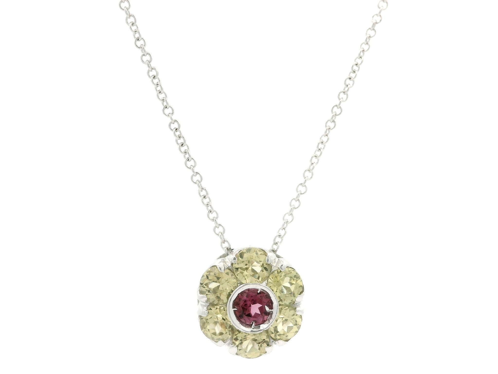 --Stone(s):--
(1) Natural Genuine Tourmaline- Round Brilliant Cut - Bezel Set - Pink 
(6) Natural Genuine Lemon Quartz - Round Brilliant Cut - Prong Set - Brilliant Lemon Yellow
(1) Natural Genuine Sapphire - Round Cabochon Cut - Bezek Set - Blue