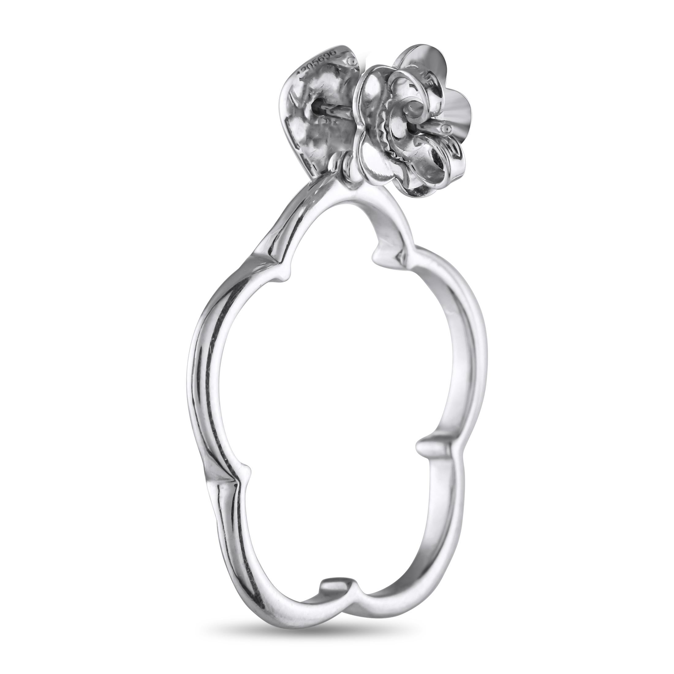 Instantly elevate any ensemble by adding these exquisite Pasquale Bruni earrings. Crafted from 18K White Gold, the delicate floral design is beautifully balanced by a leaf accent at the post. Sparkling Diamonds with a total weight of 0.73 carats