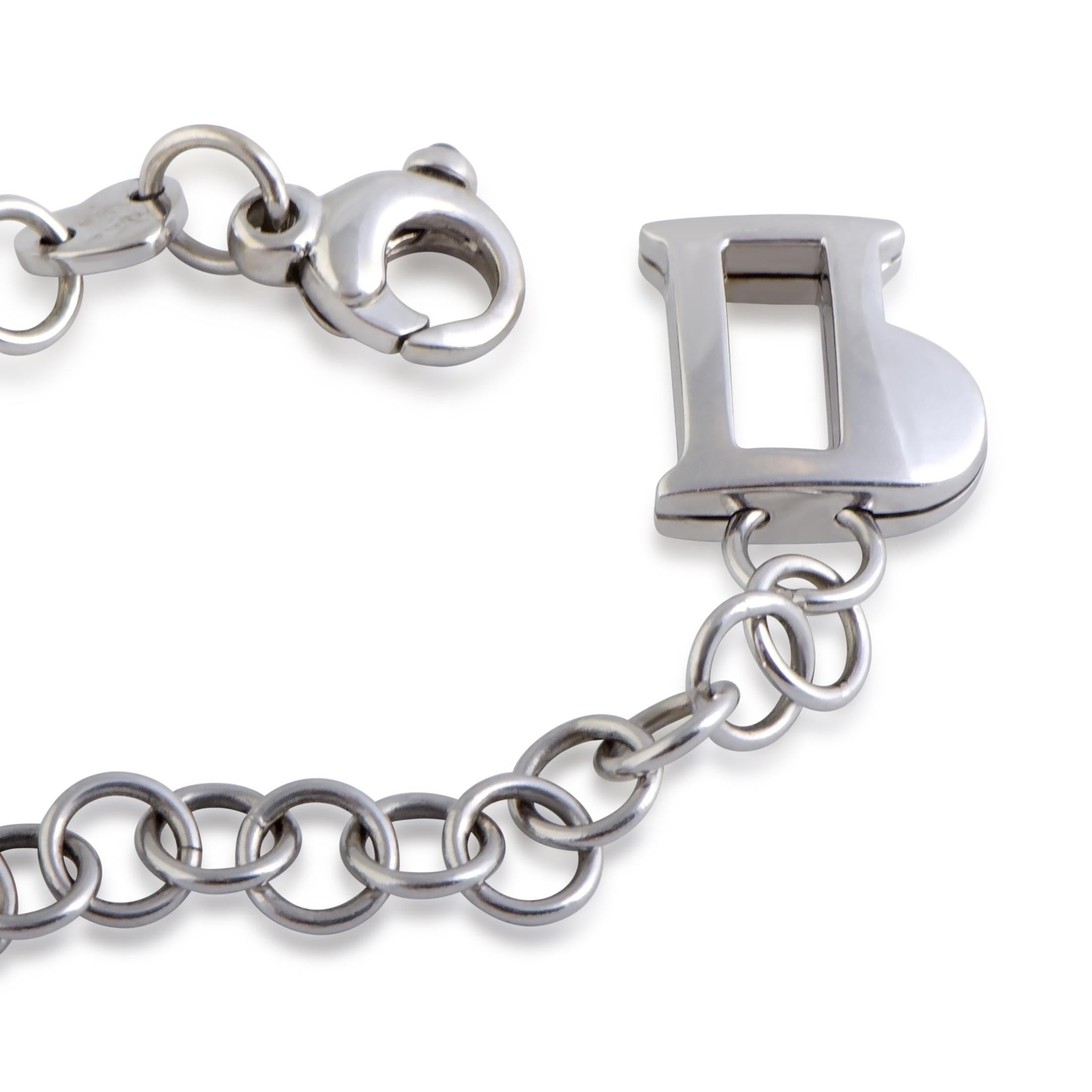 Attractively designed in glistening 18K white gold, this gorgeous charm bracelet by Pasquale Bruni is every woman's dream! The spectacular bracelet includes a charm embellished with 0.31ct of sparkling diamonds and provides ample space for multiple