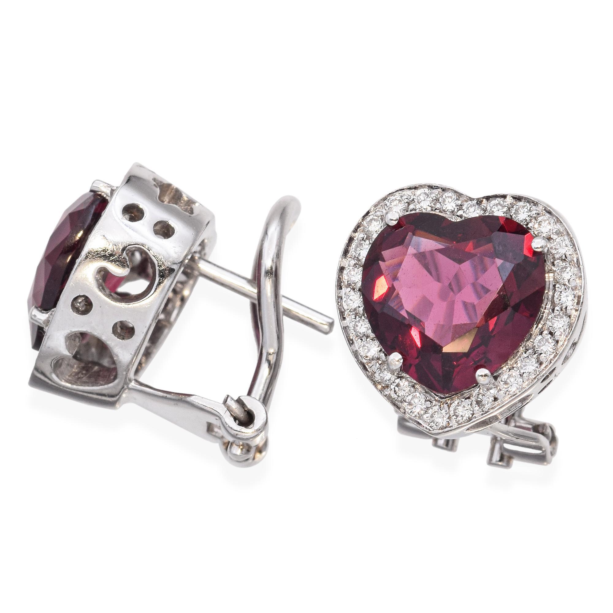 A pair of omega back stud earrings by Pasquale Bruni, crafted in 18k white gold. Each earring features a heart-cut rubellite in a striking red hue accented with round white diamonds.

Weight: 8.4 Grams 
Stone: Rubellite Tourmaline 4.26tcw (9.1 x 9 x