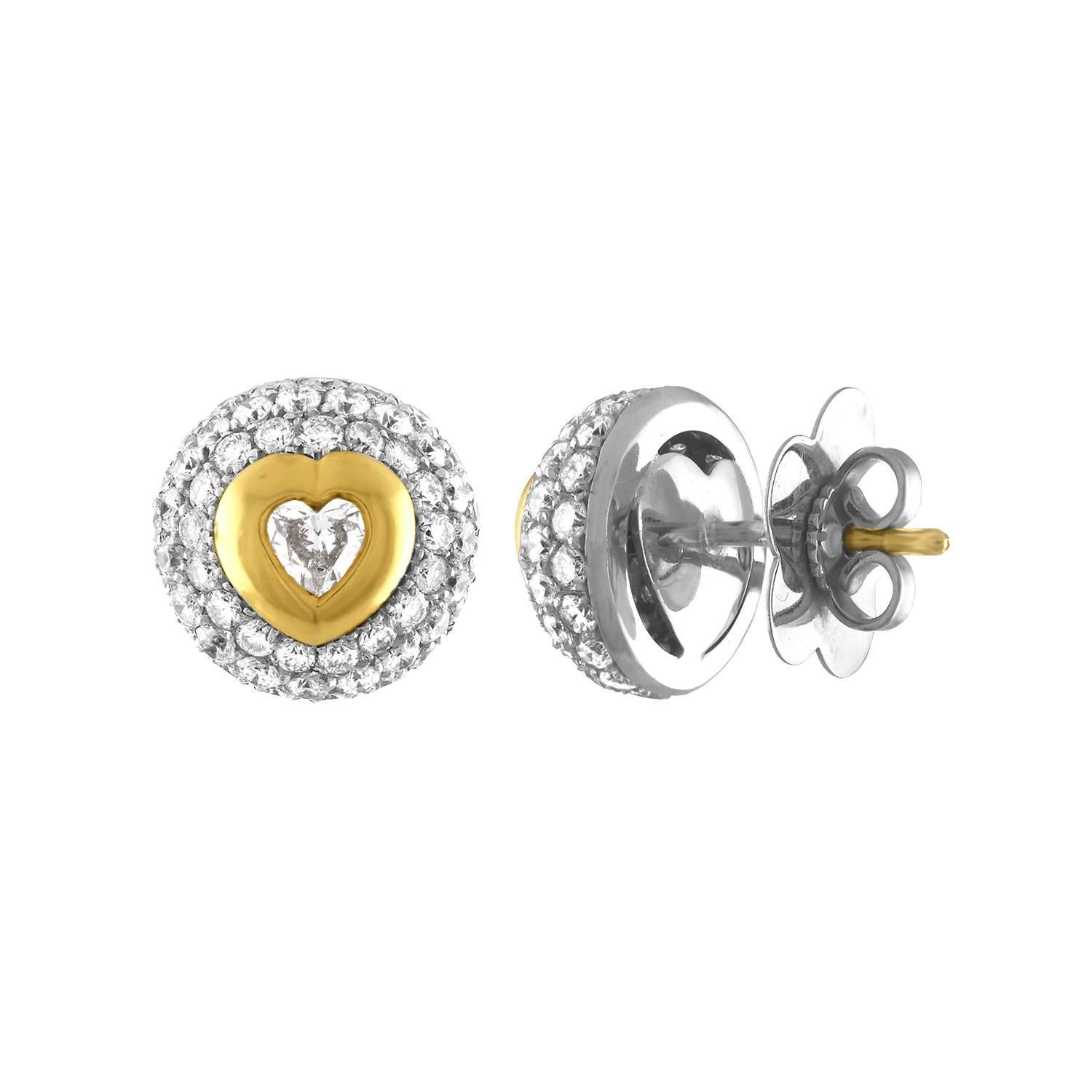 Very Beautiful Button With Center Heart Stud Earrings
The earrings are 18K White And Yellow Gold
There are 3.50 Carats in Diamonds F/G VS
The earrings are by Pasquale Bruni Made in Italy
The makers mark 2211 AL and 750 is on the posts of the