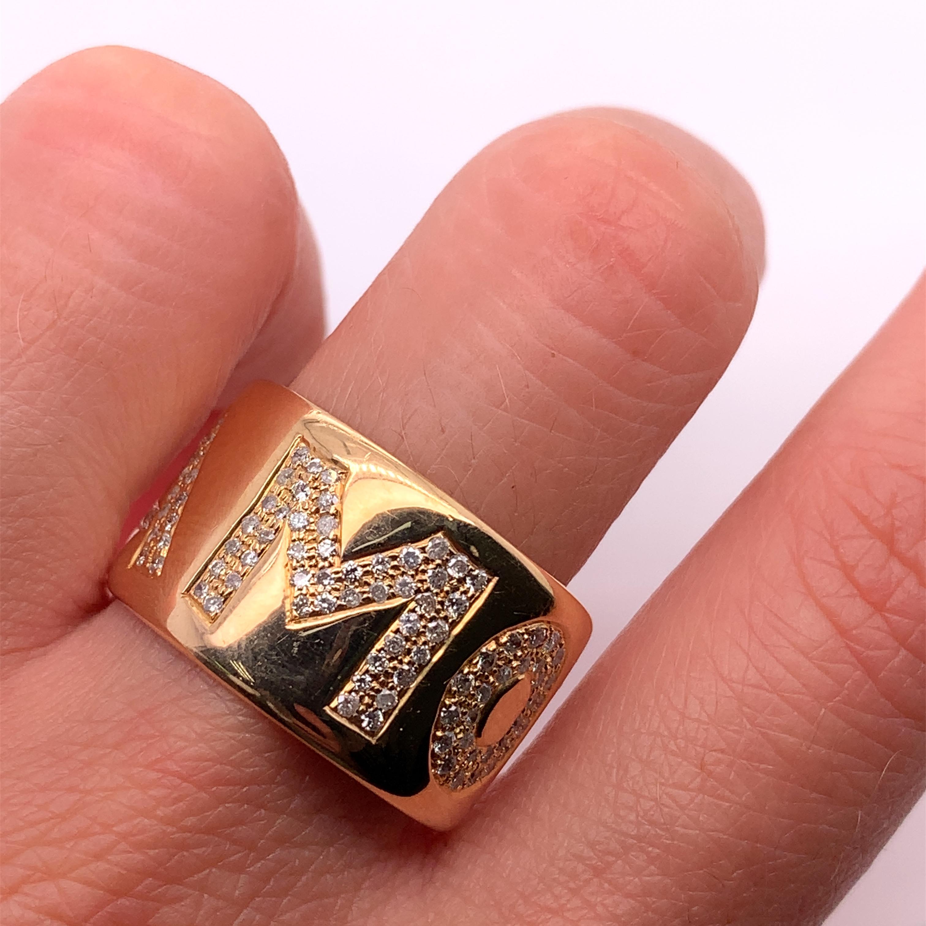 
0.90ct AMORE Diamond Pasquale Bruni 18k yellow gold wide band ring.

Large Italian designer chunky wedding or cocktail ring

Please note, the ring was customised previously in order to resize the ring the letter E was removed along with the