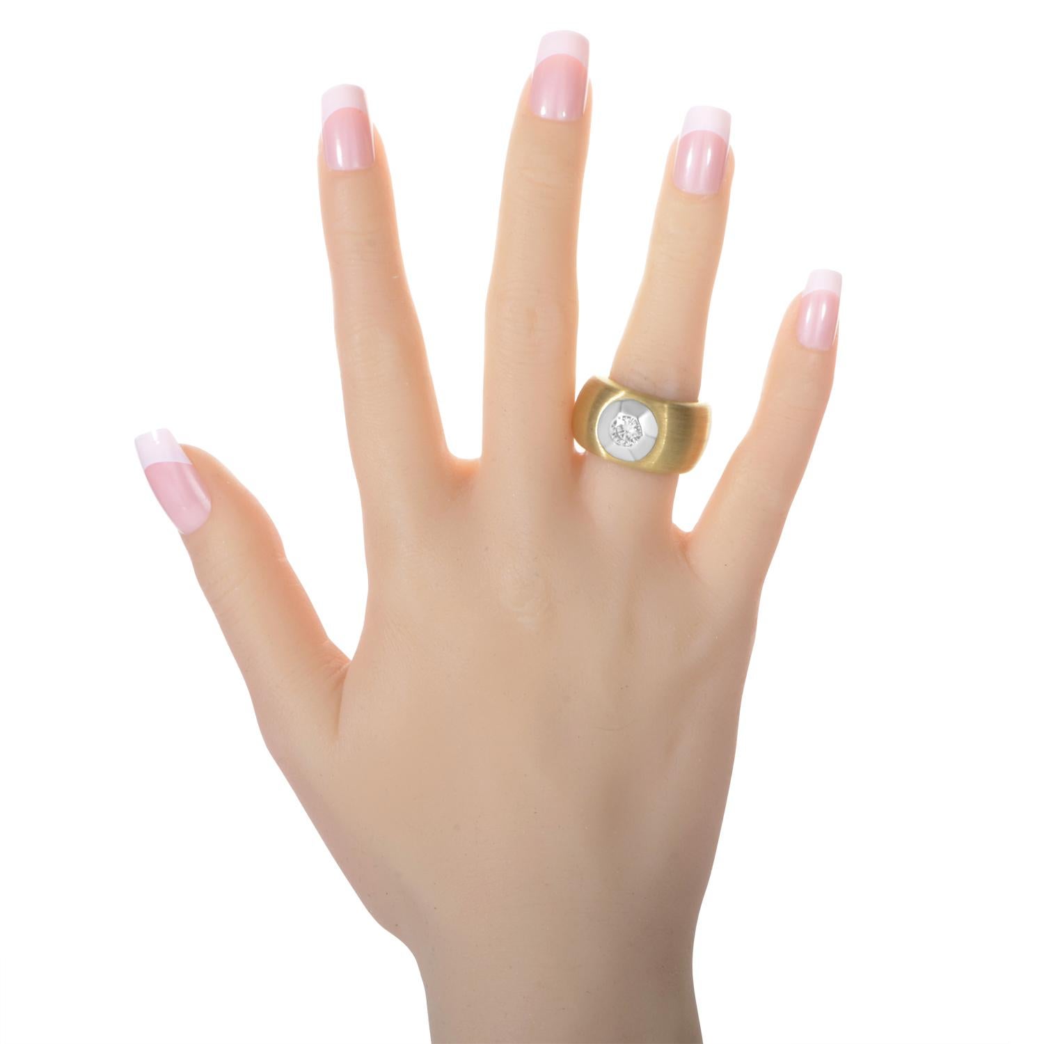 This tastefully designed ring from Pasquale Bruni is perfect for any lady. The thick band is made of brushed 18K yellow gold and features a .73ct diamond set in a white gold bezel.<Br/>Ring Top Dimensions: 14 x 14mm
