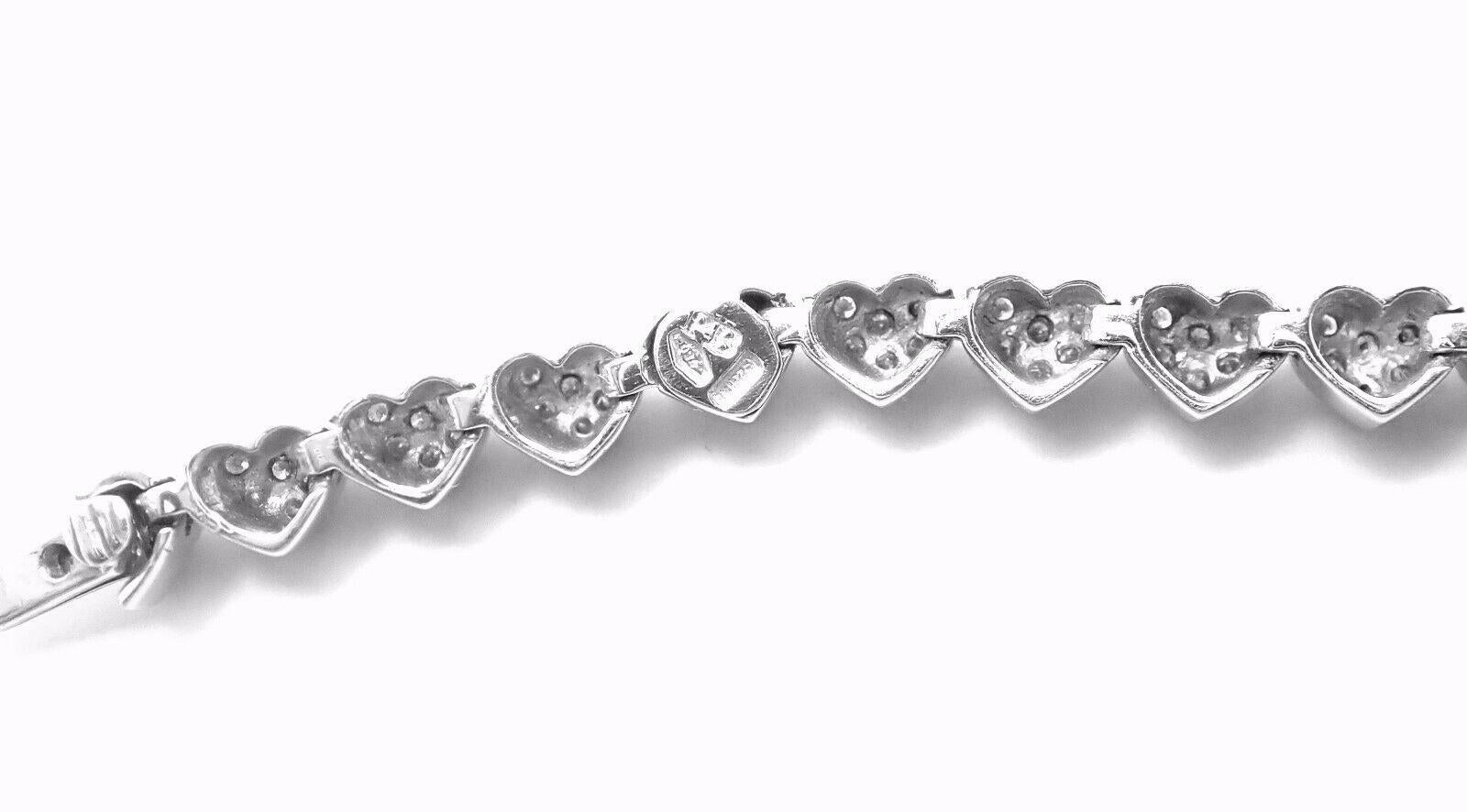 18k White Gold Diamond Heart Tennis Bracelet by Pasquale Bruni.
With 204 round brilliant cut diamonds VS1 clarity, G color total weight approx. 1.53ct
This bracelet comes with Box and Certificate.
Details:
Length: 7 inches long
Weight: 18.9