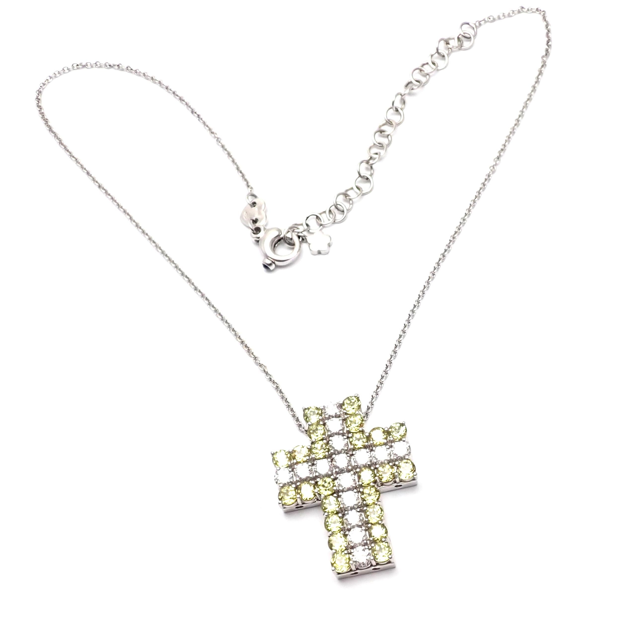 18k White Gold Diamond And Peridot Cross Pendant Necklace by Pasquale Bruni.  
With 15 round brilliant cut diamonds total weight approx. 2.6ct 
26 Peridots
This necklace comes with Box And Certificate.   
Details:  
Length: 16