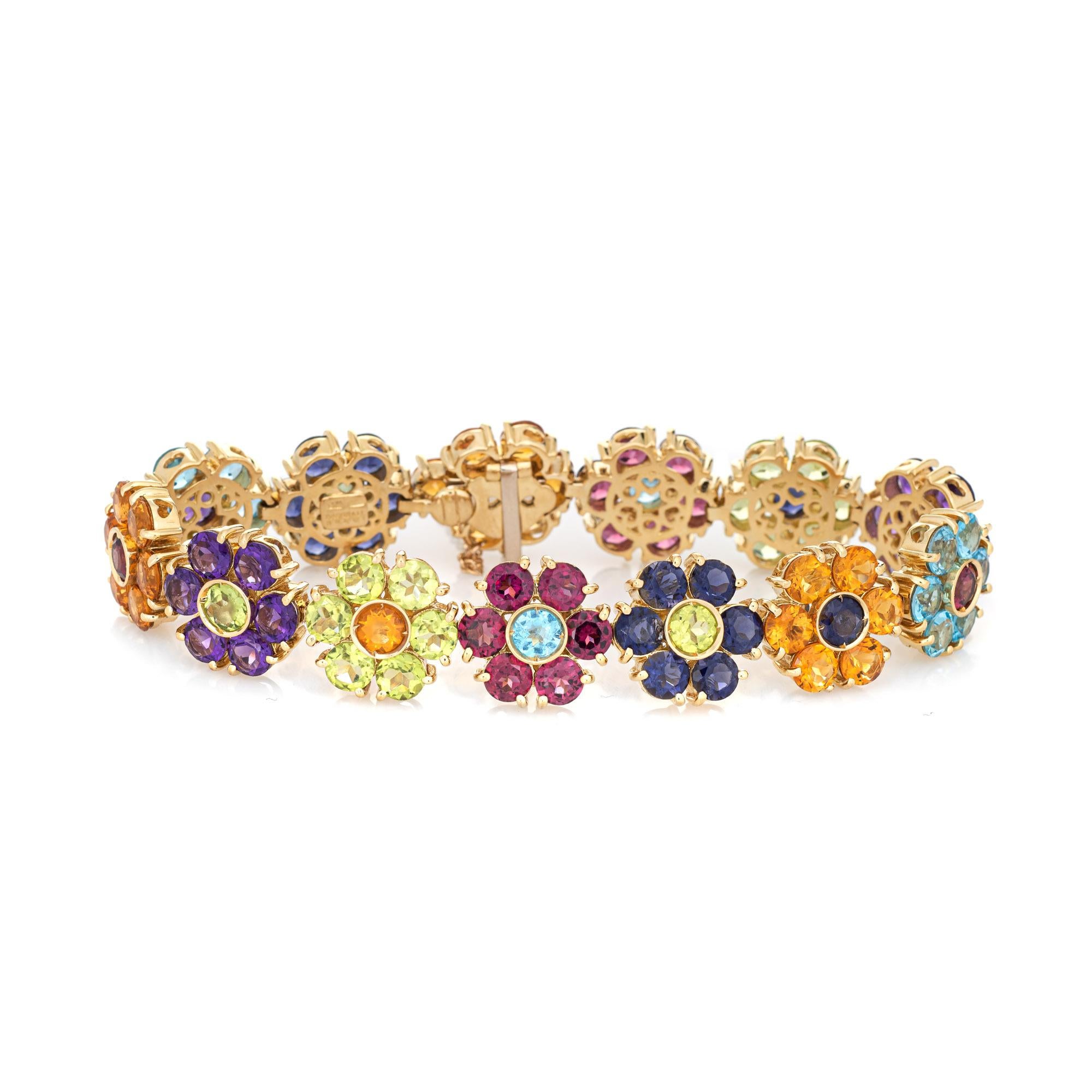 Stylish and finely detailed Pasquale Bruni flower bracelet crafted in 18k yellow gold. 

Multi gemstones (peridot, citrine, blue topaz, sapphires, citrine, pink tourmaline, amethyst) are estimated at 0.20 to 0.25 carats each (total estimated weight