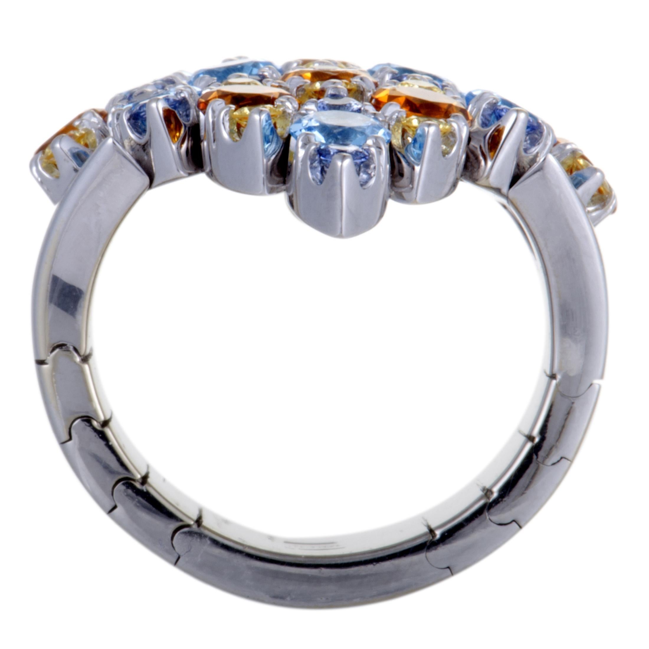 This glamorous 18K white gold ring by Pasquale Bruni exhibits a sensationally alluring style and an extravagantly feminine appeal. The gorgeous ring features 1.24ct of dazzling sapphires and 4.12ct breathtaking topaz and citrine stones that