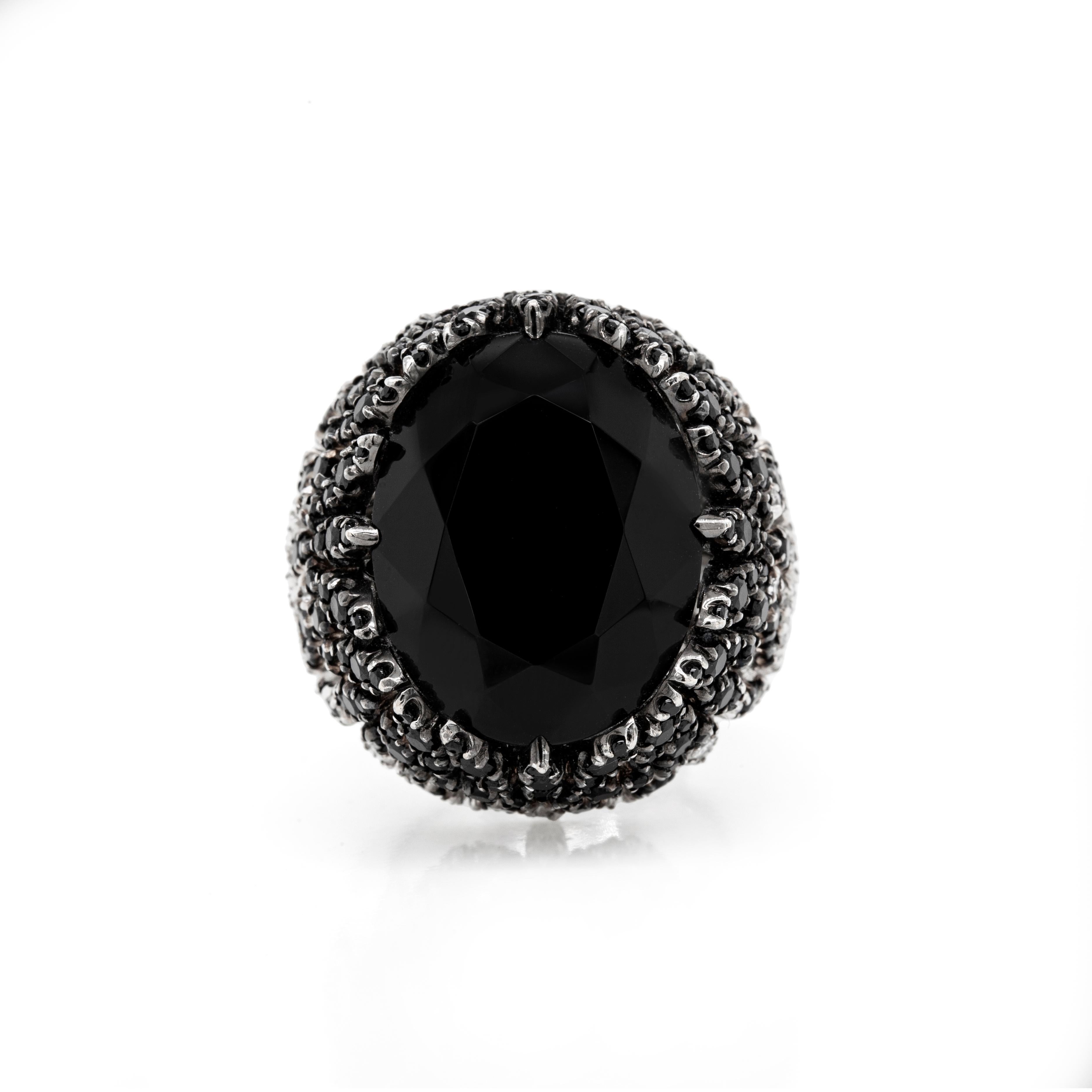 Magnificent and bold, this breathtaking cocktail ring from Pasquale's Bruni 'Ghirlanda' collection is masterfully handcrafted from 18 carat white gold. Taking center-stage is an impressive oval onyx measuring approximately 21x17mm, beautifully