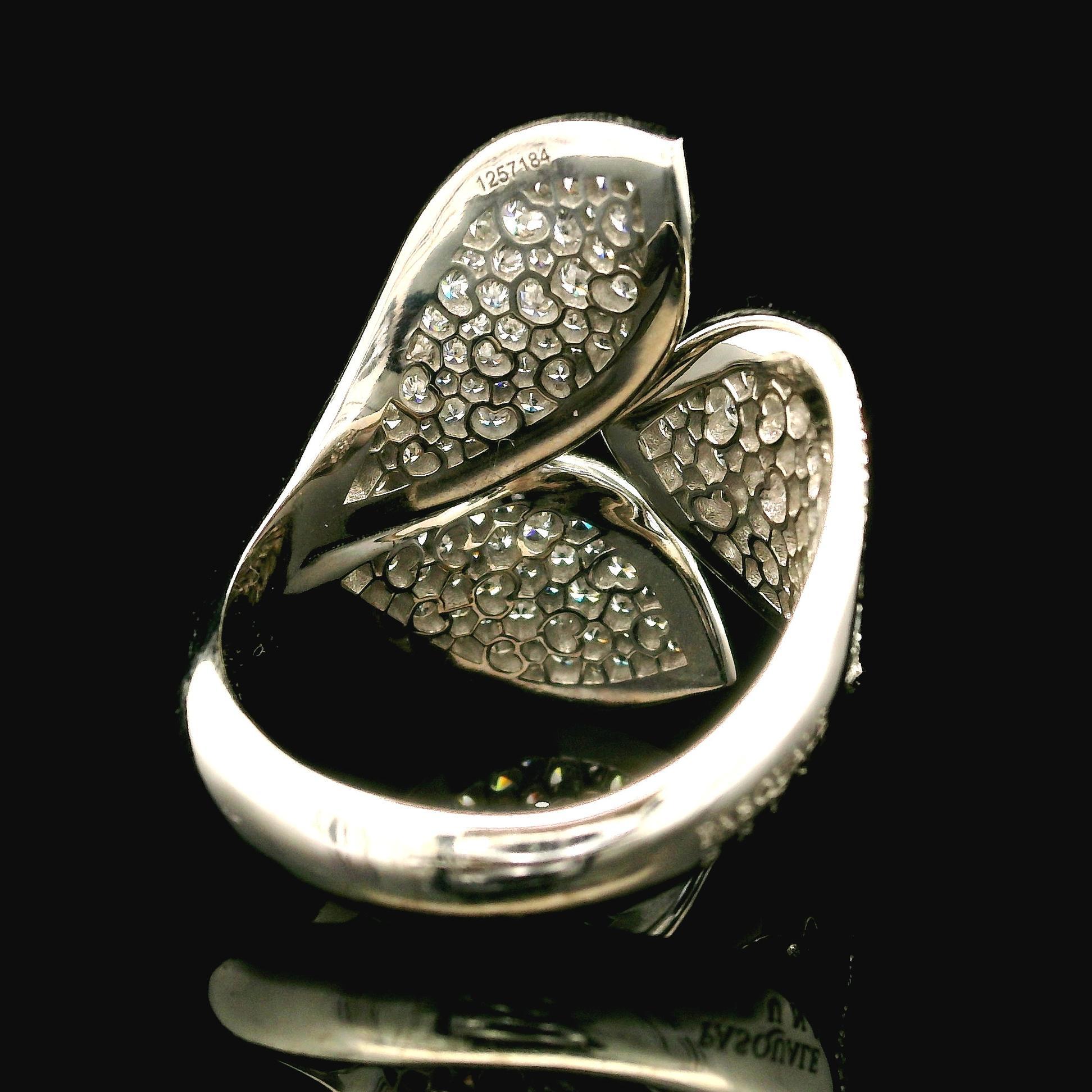 --Stone(s):--
Numerous Natural Genuine Diamonds - Round Brilliant Cut - Pave Set - E/F Color - VVS-VS Clarity - 2.15ctw (exact)

Material: Solid 18K White Gold
Weight: 7.90 Grams
Ring Size: 9.0 (We can custom size this ring - please contact us prior