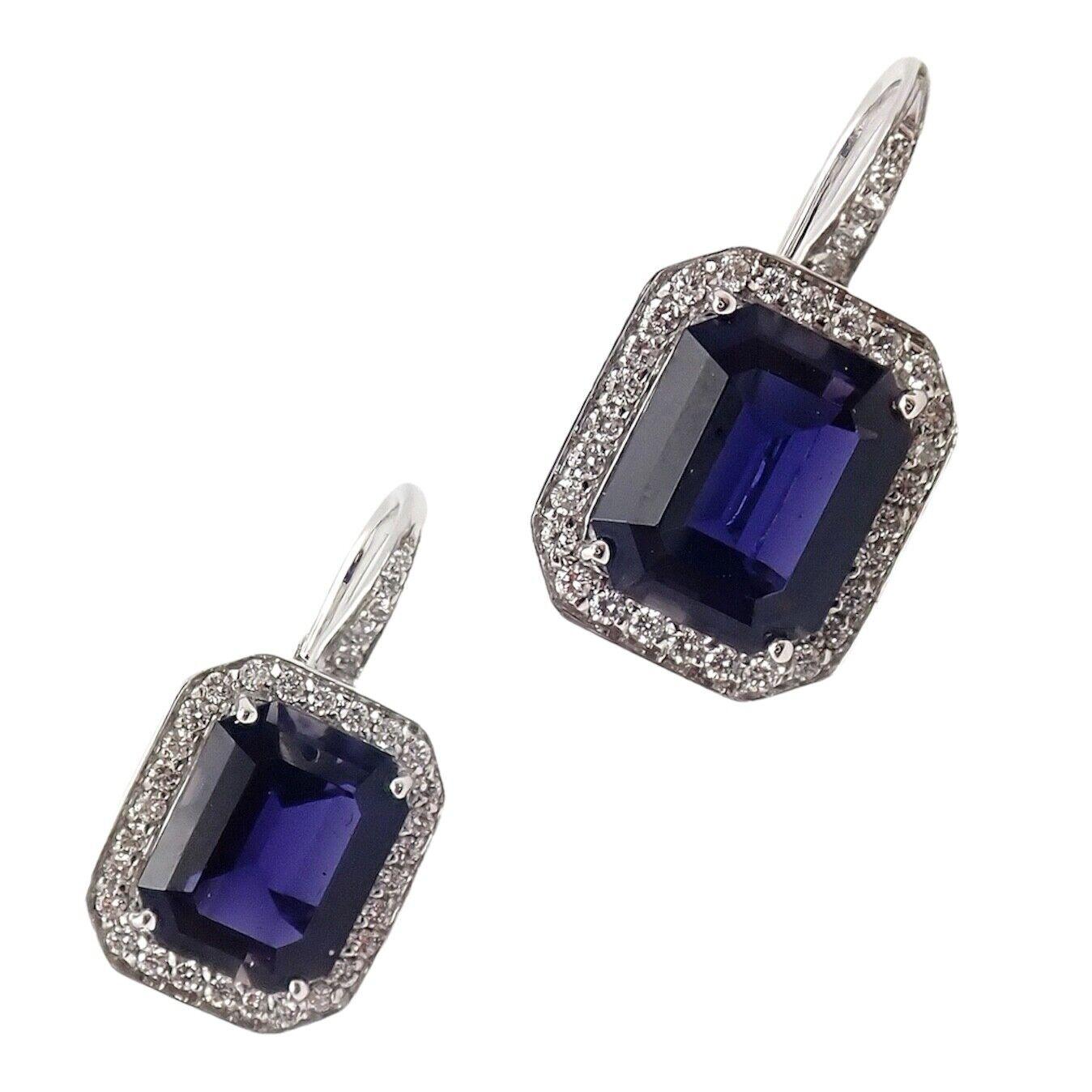 18k White Gold Diamond Iolite Earrings by Pasquale Bruni.
With 2 Iolite stones, 8mm x 10mm
70 Round Brilliant Cut Diamonds G/VS2, Total Weight approximately 0.70ctw
These earrings come with Box and Certificate.
Retail Price: