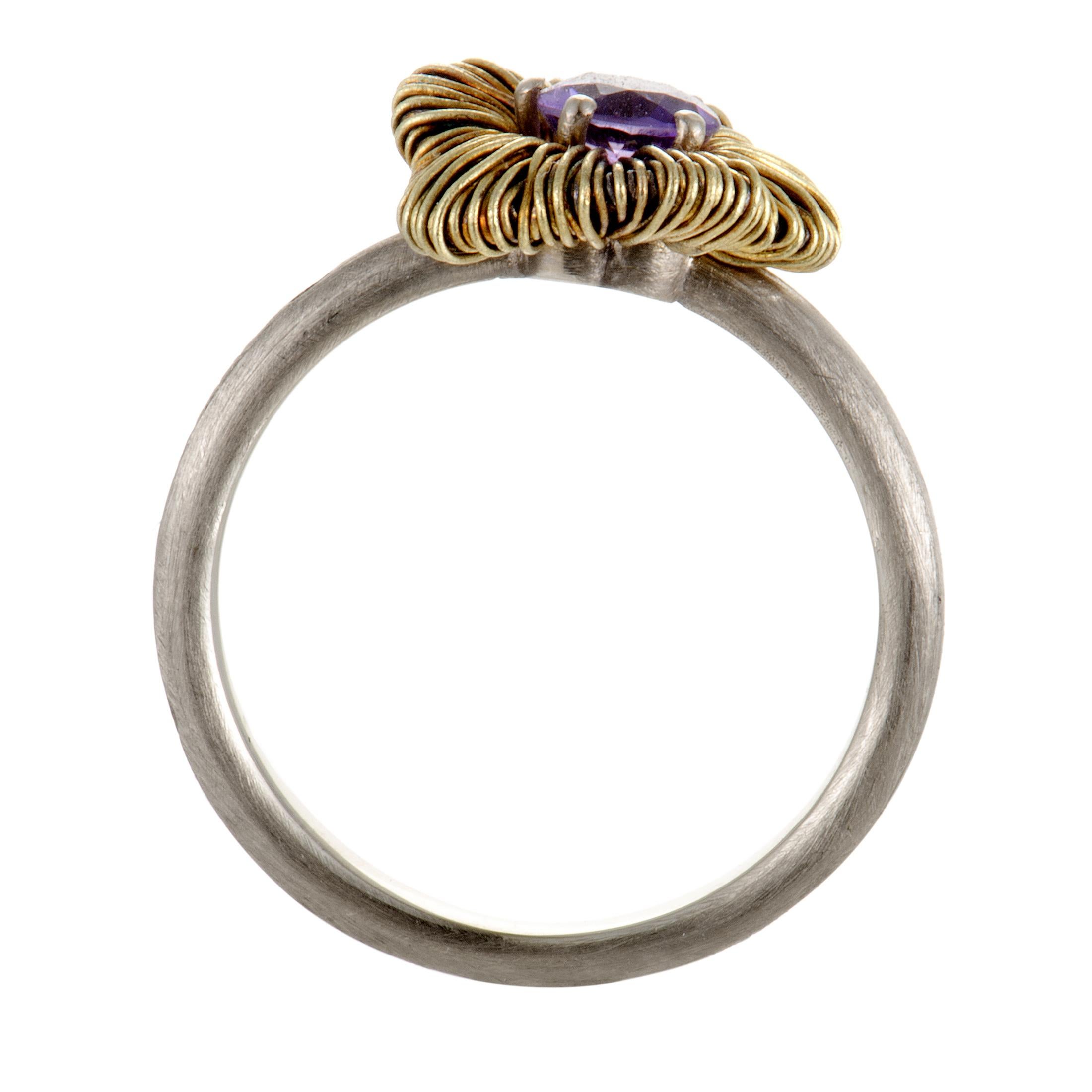 Gorgeously complementing tones and a resolutely feminine overall spirit of this marvelous ring from Pasquale Bruni produce a fabulous effect, with a nifty amethyst added to 18K yellow gold and gleaming silver.
