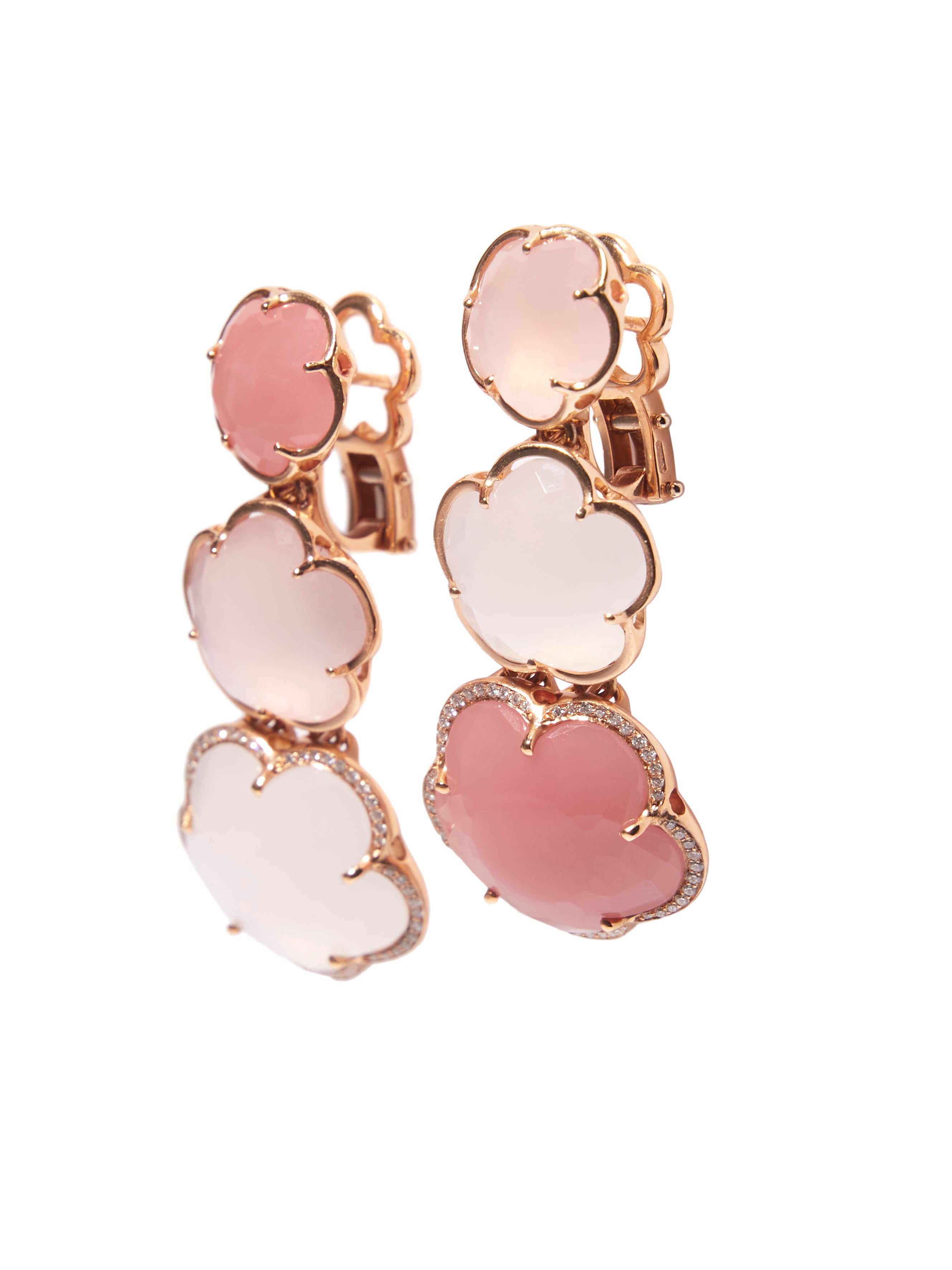 These 18 karat rose earrings with natural pink chalcedony, milky and pink quartz and diamonds are from the iconic Bon Ton Collection by Pasquale Bruni. The five-petal flower is the icon of Italian designer. The shimmering gemstones  Pink Chalcedony,