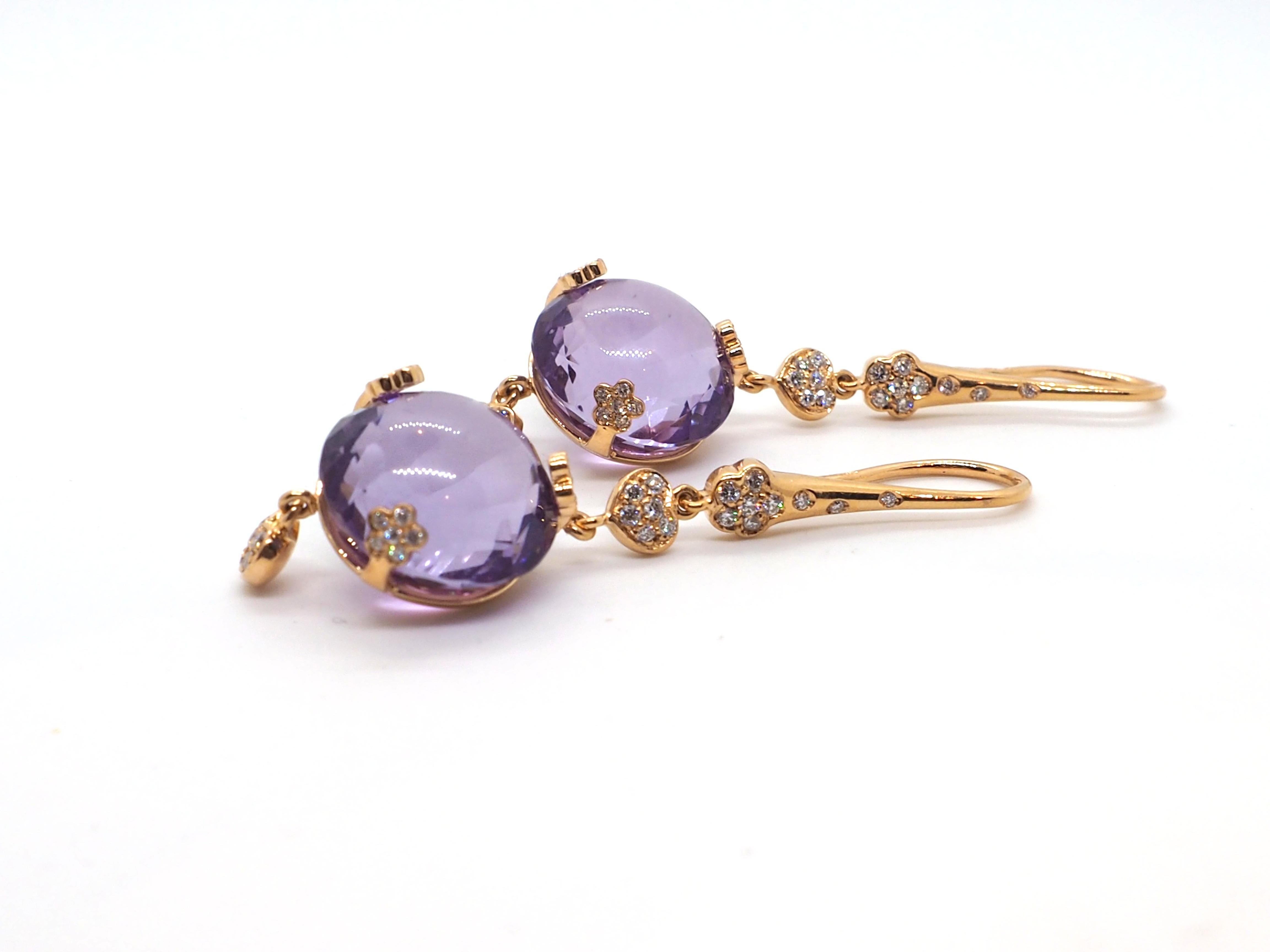 The earrings from the Pasquale Bruni Sissy collection are beautifully crafted and add an elegant and glamorous touch to any outfit. The earrings are made of 18kt rose gold and feature a round amethyst in the center surrounded by sparkling diamonds.
