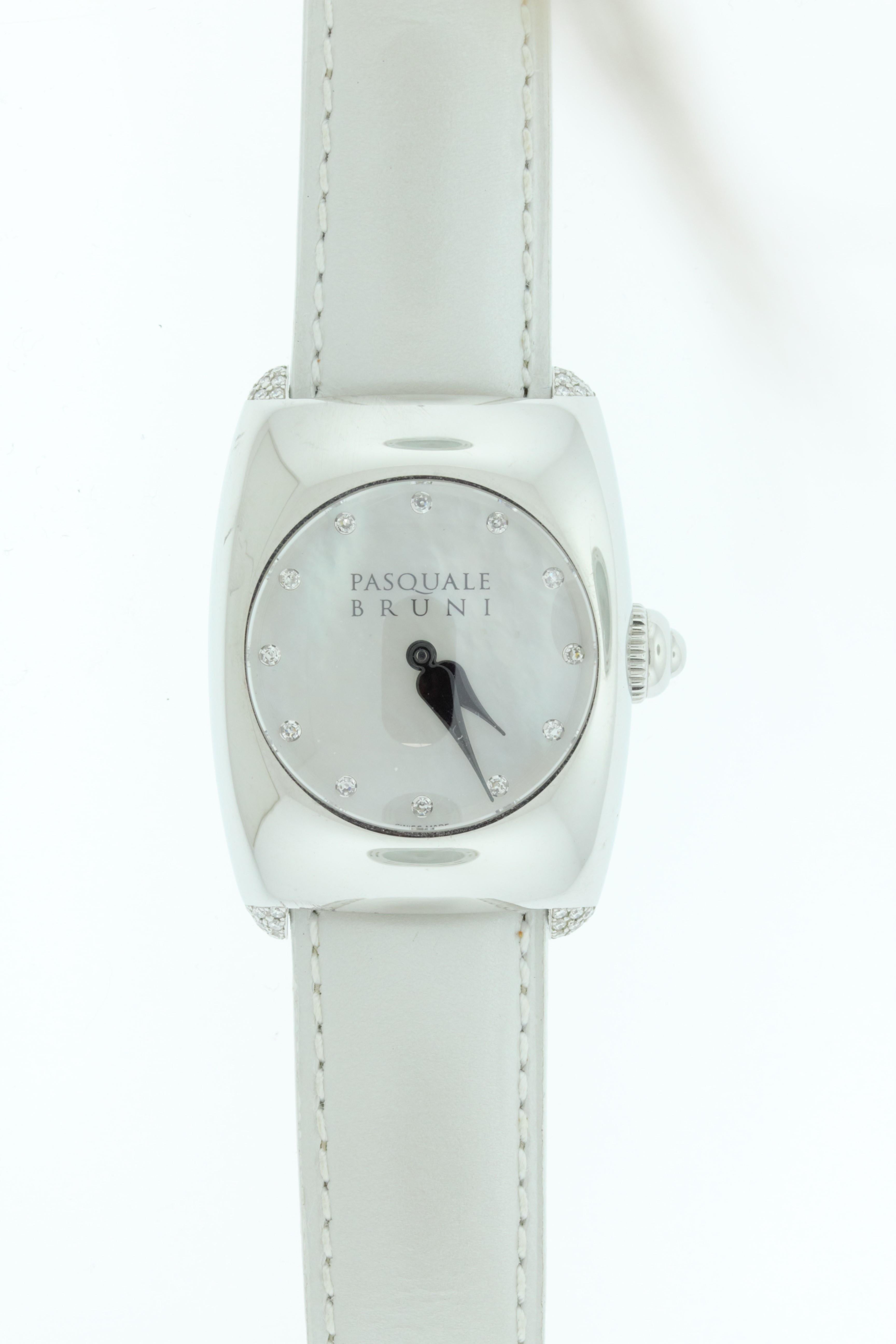 This ladies watch features a stainless steel bezel with a white face and diamond hour markers and a white leather strap. Swiss made by Pasquale Bruni. 

