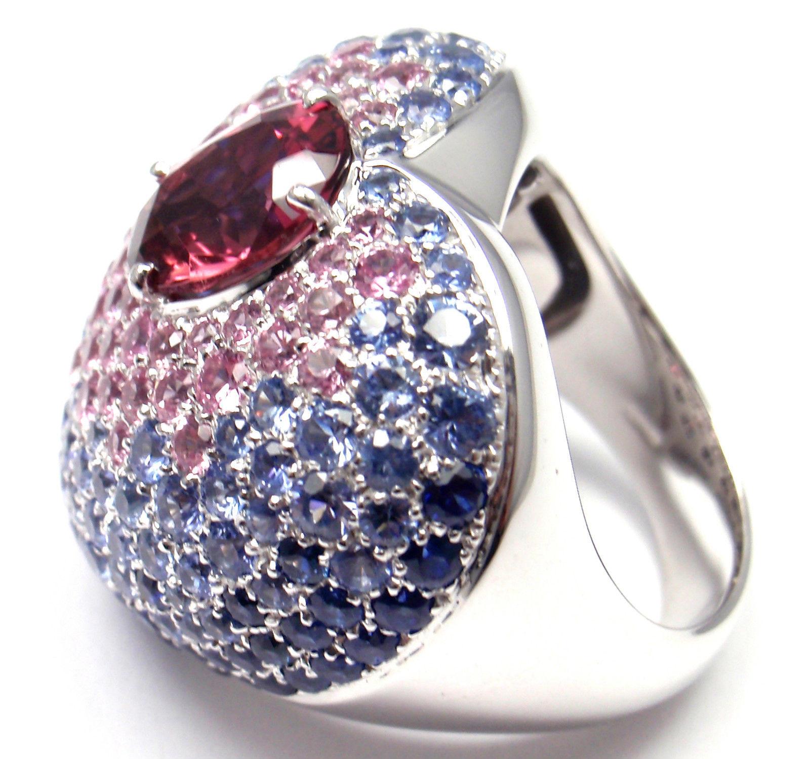 18k White Gold Sapphire Pink Tourmaline VANITA Ring by Pasquale Bruni.
With Sapphires (blue & pink) 7.31ct
Pink Tourmaline 2.2ct
This ring comes with Box, Certificate and Tag. 
Details:
Size: 7
Weight: 23.1 grams
Width: 26.5mm
Stamped Hallmarks:
