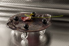 Pass the Dutchie, a ceramic serving platter on wheels