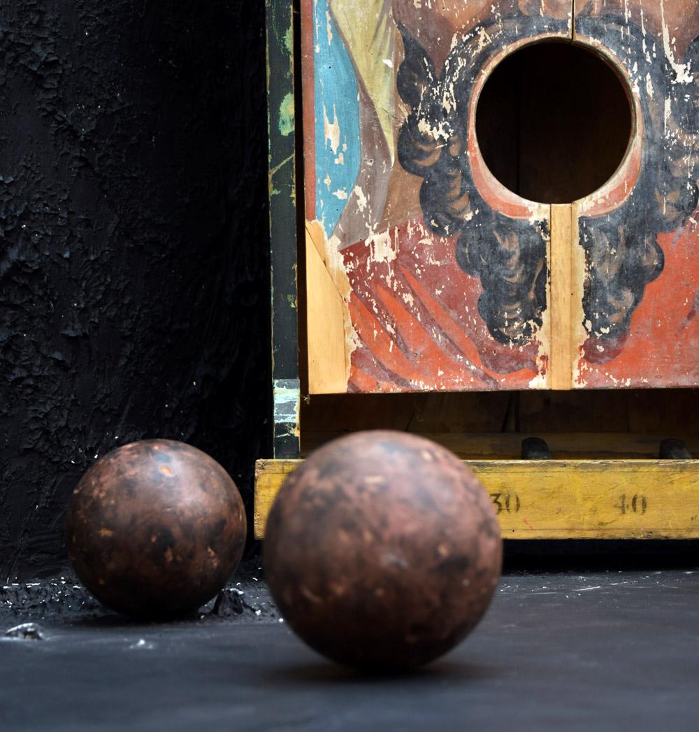 Antique Passe-Boules French fairground game
A rare French Passé-boules ball toss game circa 1920 made from wood, painted polychrome and lithographed paper. Antique ball toss game, so-called passé-boule high-rectangular, box-shaped structure centric