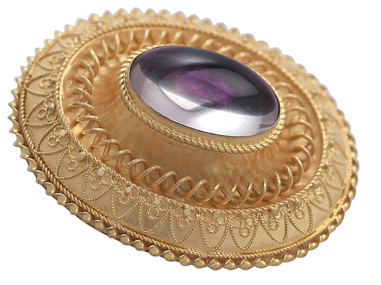 A fine and impressive antique Victorian paste and 15 karat yellow gold brooch; part of our antique jewelry and estate jewelry collections.

This impressive antique Victorian brooch has been crafted in 15k yellow gold.

The antique gold brooch