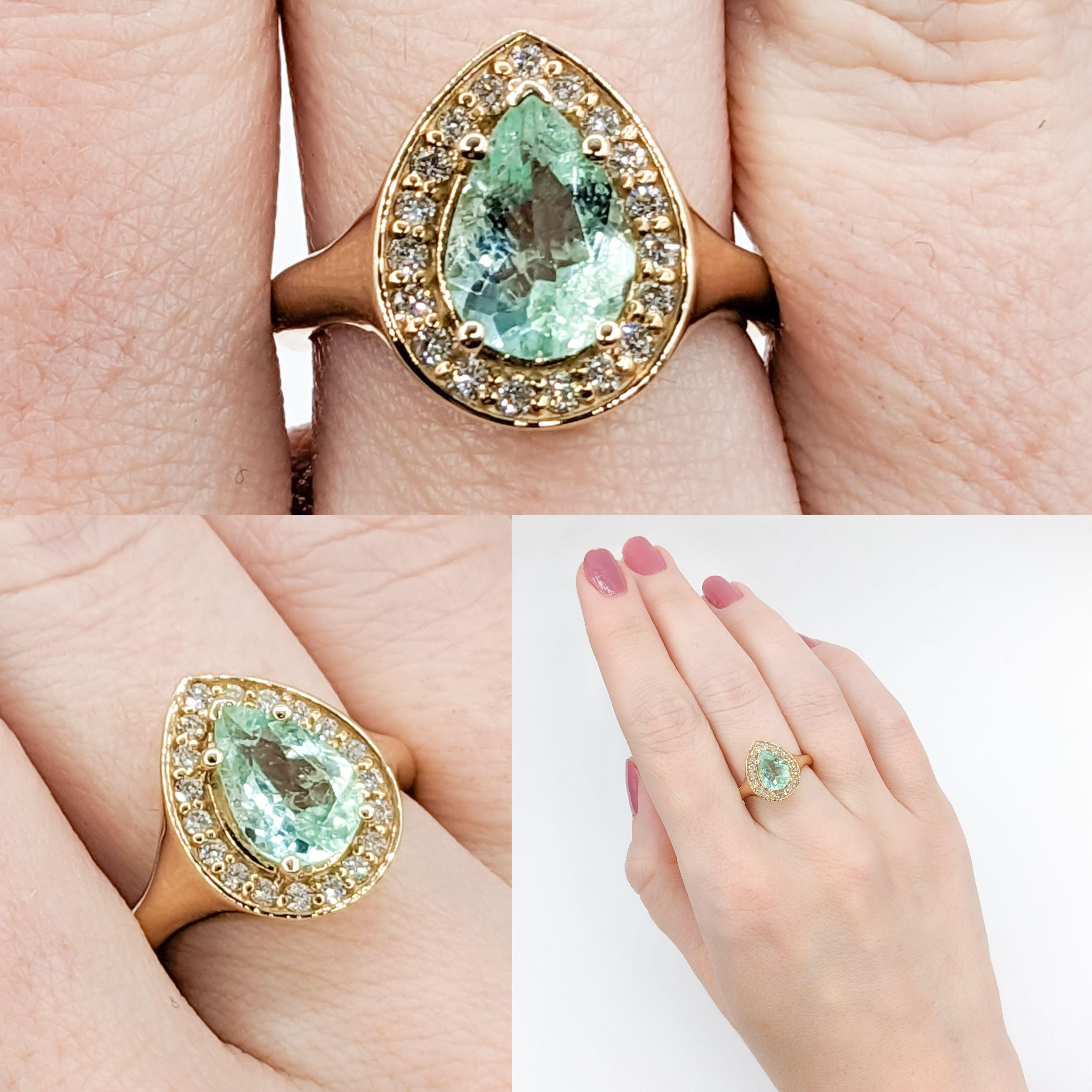 Custom 1.45ct Colombian Emerald Diamond Halo Ring

This beautiful pear shaped ring, nestled in high-quality 14k yellow gold, showcases a stunning centerpiece: a 1.45ct Colombian Emerald that dazzles with a pastel green hue. Further enhancing the