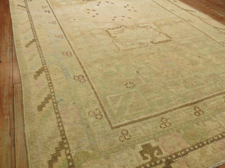 Pastel Antique Khotan Rug with Camel Background For Sale at 1stDibs