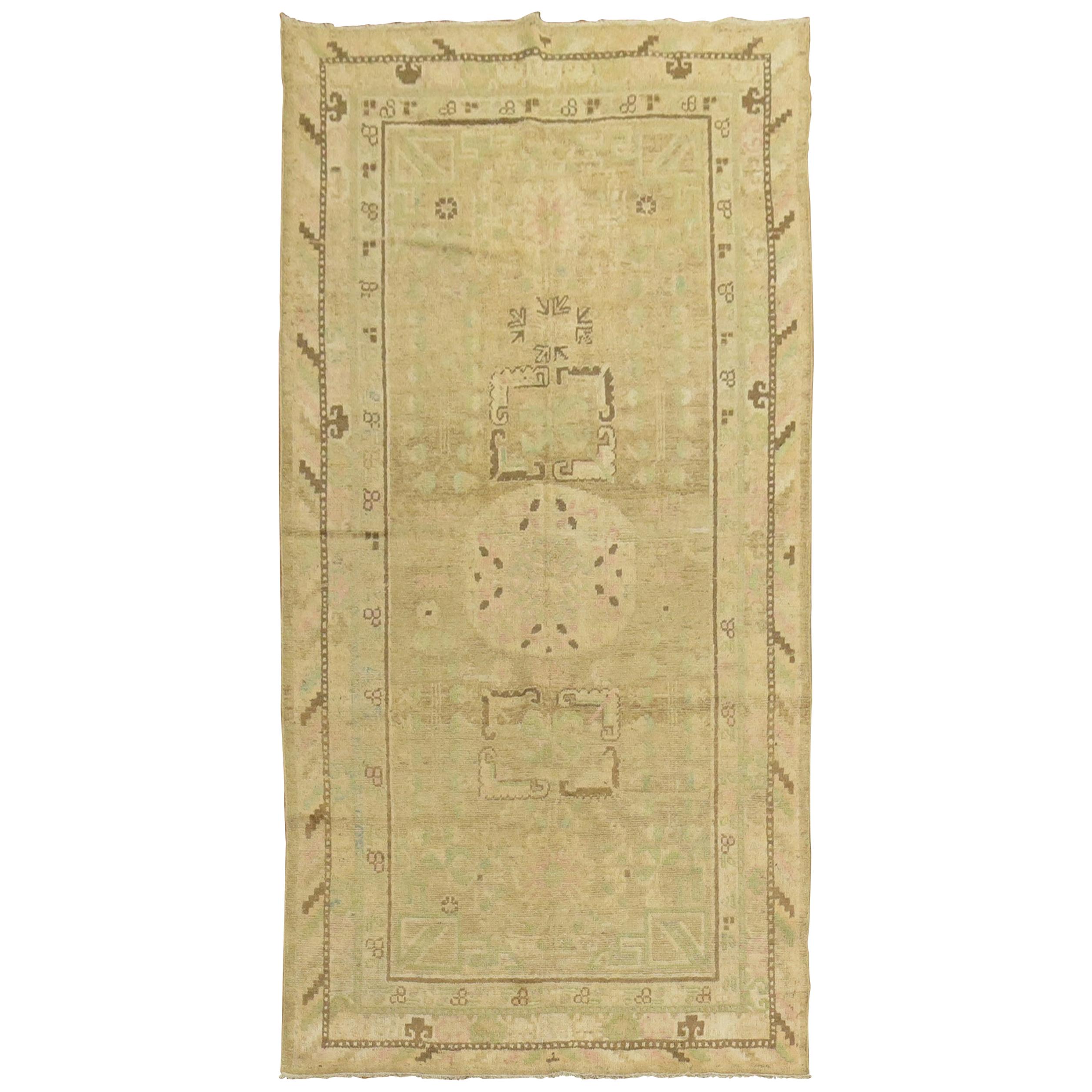 Pastel Antique Khotan Rug with Camel Background For Sale