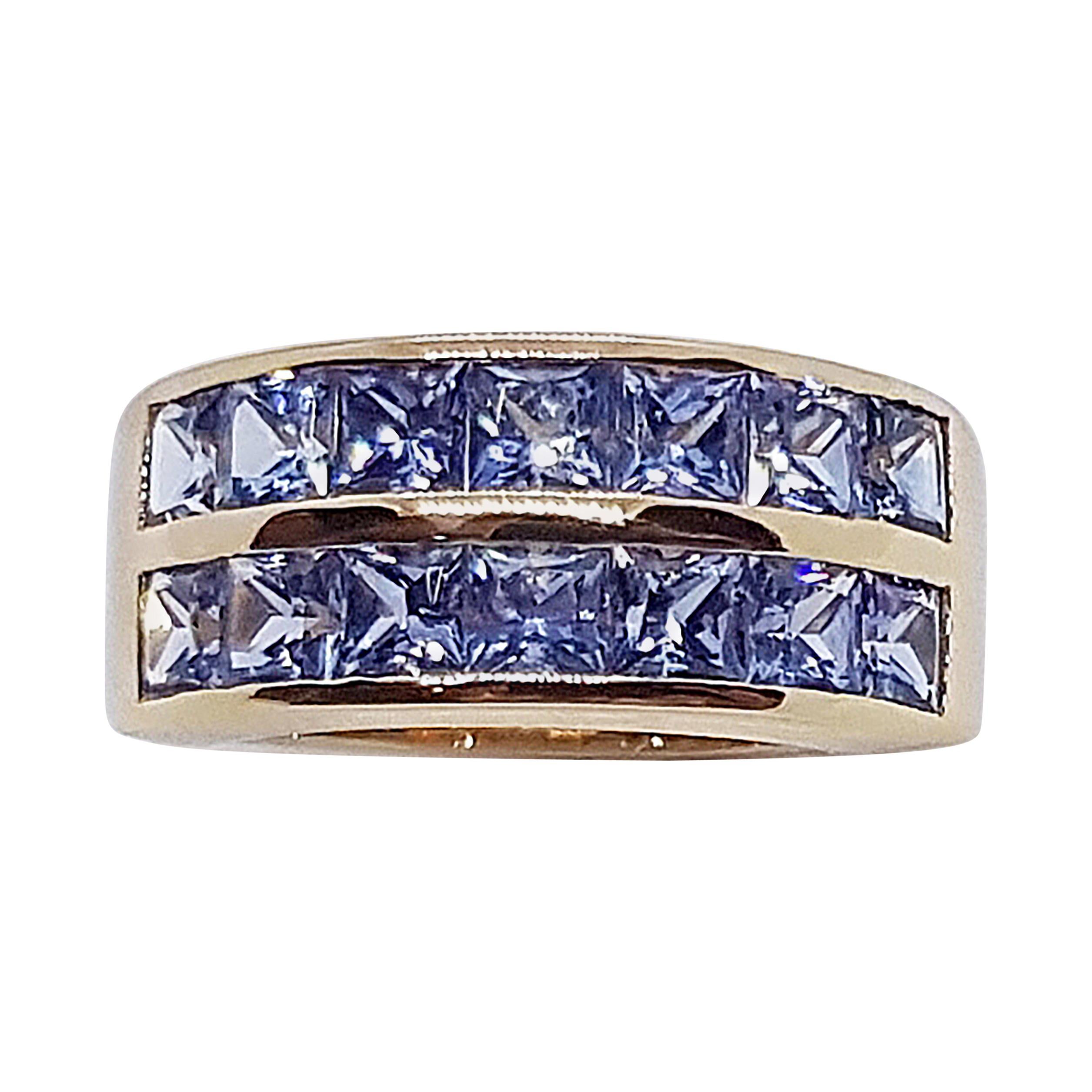 Pastel Blue Sapphire Ring Set in 18 Karat Rose Gold Settings For Sale