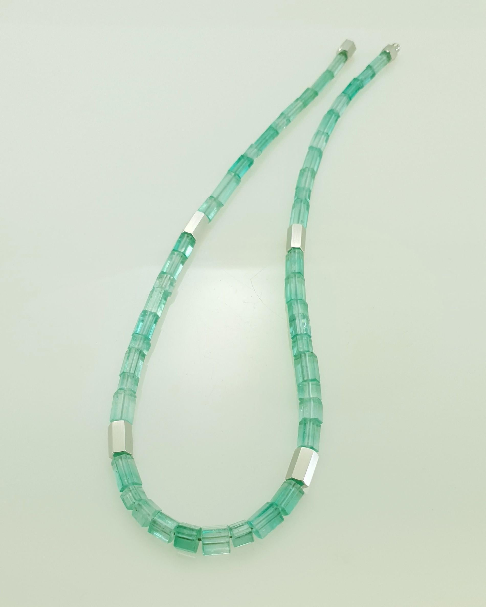 This pastel green Beryl Crystal Beaded Necklace with 18 Carat Mat white Gold is totally handmade. Cutting as well as goldwork are made in German quality. The screw clasp is easy to handle and very secure. The crystals surface is completly natural