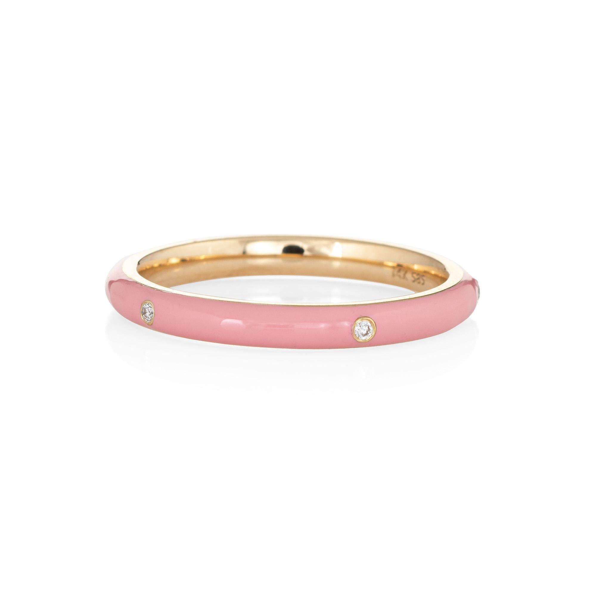 Stylish light pastel pink enamel & diamond stacking band crafted in 14 karat yellow gold. 

5 round brilliant cut diamonds total an estimated 0.03 carats (estimated at H-I color and SI2-I1 clarity). 

The enameled band is a striking pastel pink