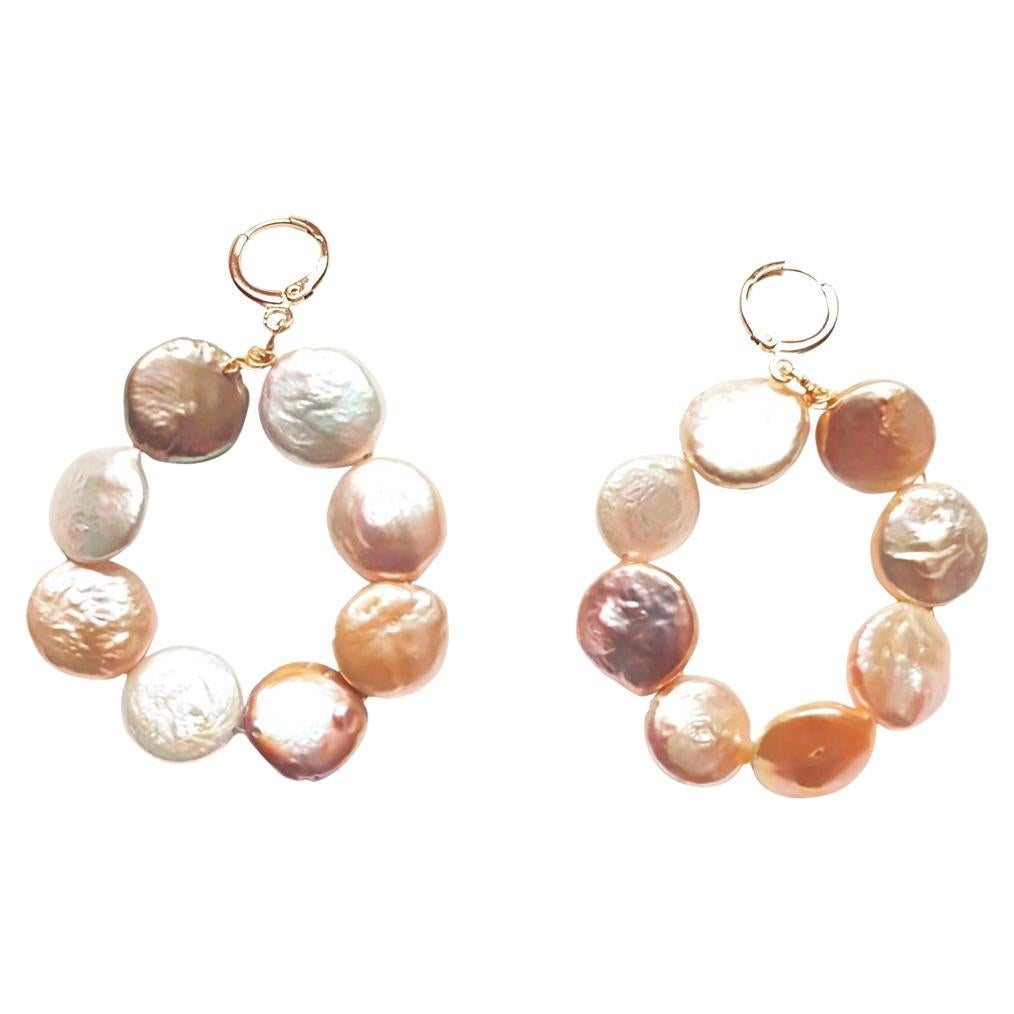 Pastel Pink freshwater pearl hoop earrings  by Ifemi Jewels