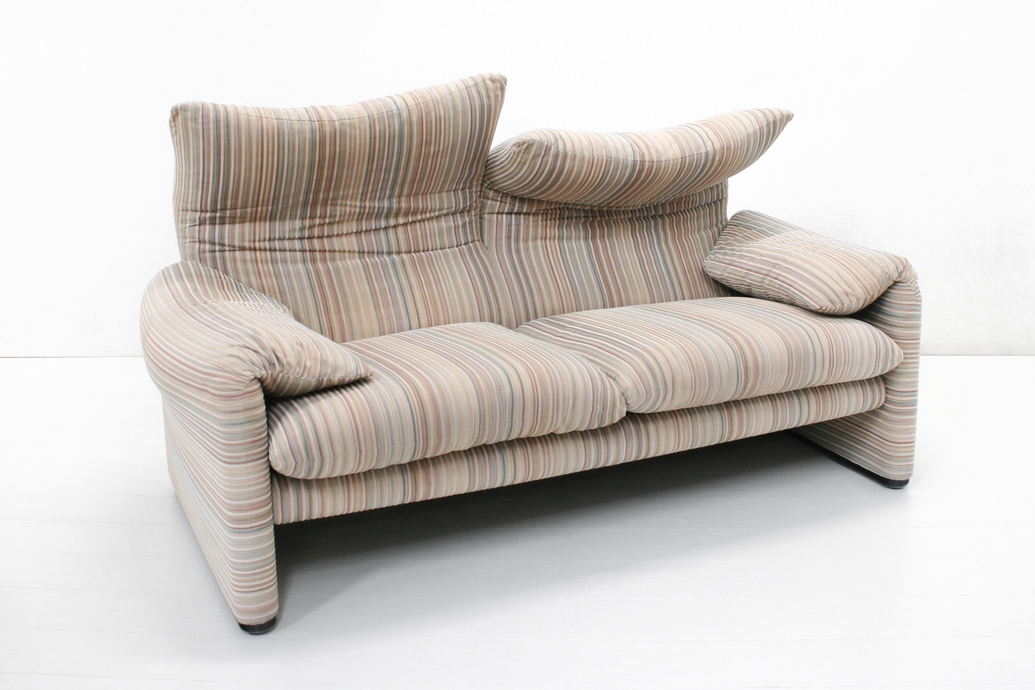 This two-seater Maralunga is executed in a pastel striped upholstery which gives it a cool eighties vibe.