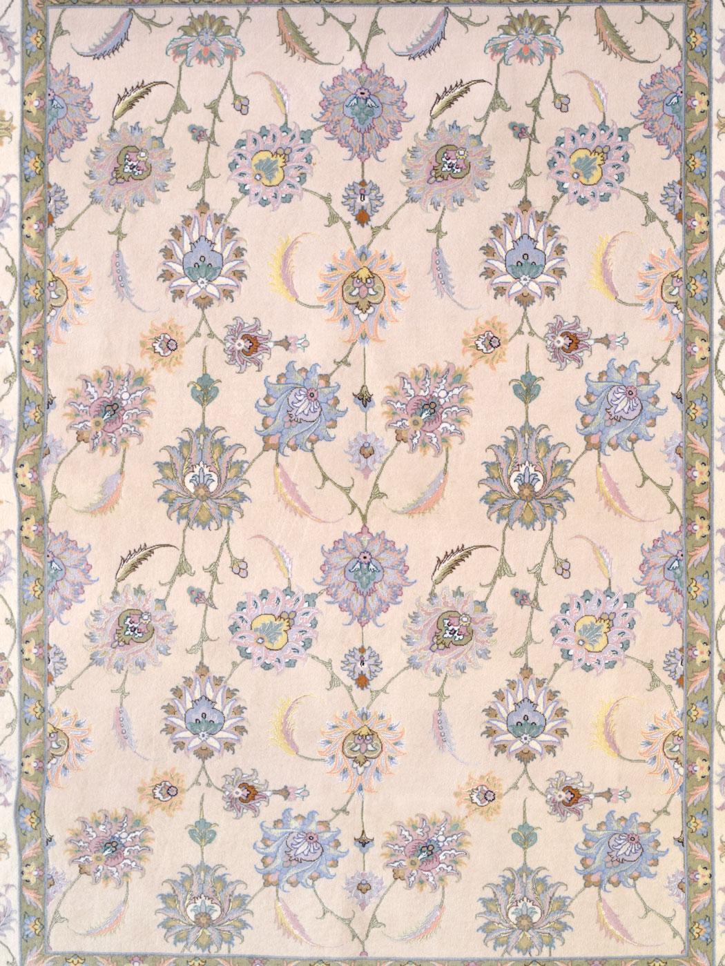 Elevate your space with the serene beauty craftsmanship of this 5' x 7' pastel, wool and silk Persian Tabriz carpet. Measuring exactly 5' x 7'1