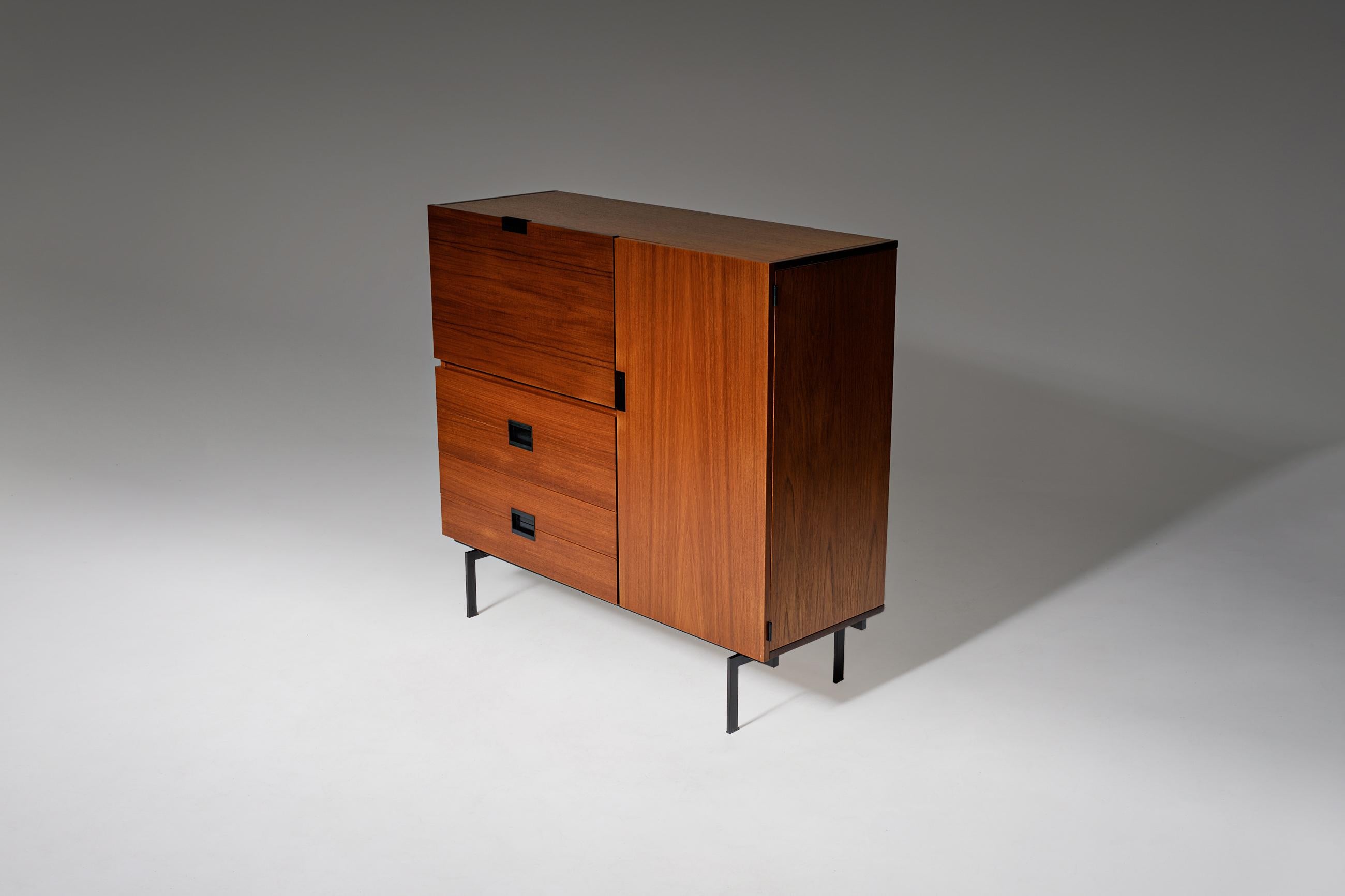 Mid-Century Modern high board or bar cabinet by Cees Braakman for UMS Pastoe, The Netherlands 1958. The cabinet is part of the famous Japanese series. Constructed out of teak with a deep and warm color. The cabinet stands on a minimalistic black