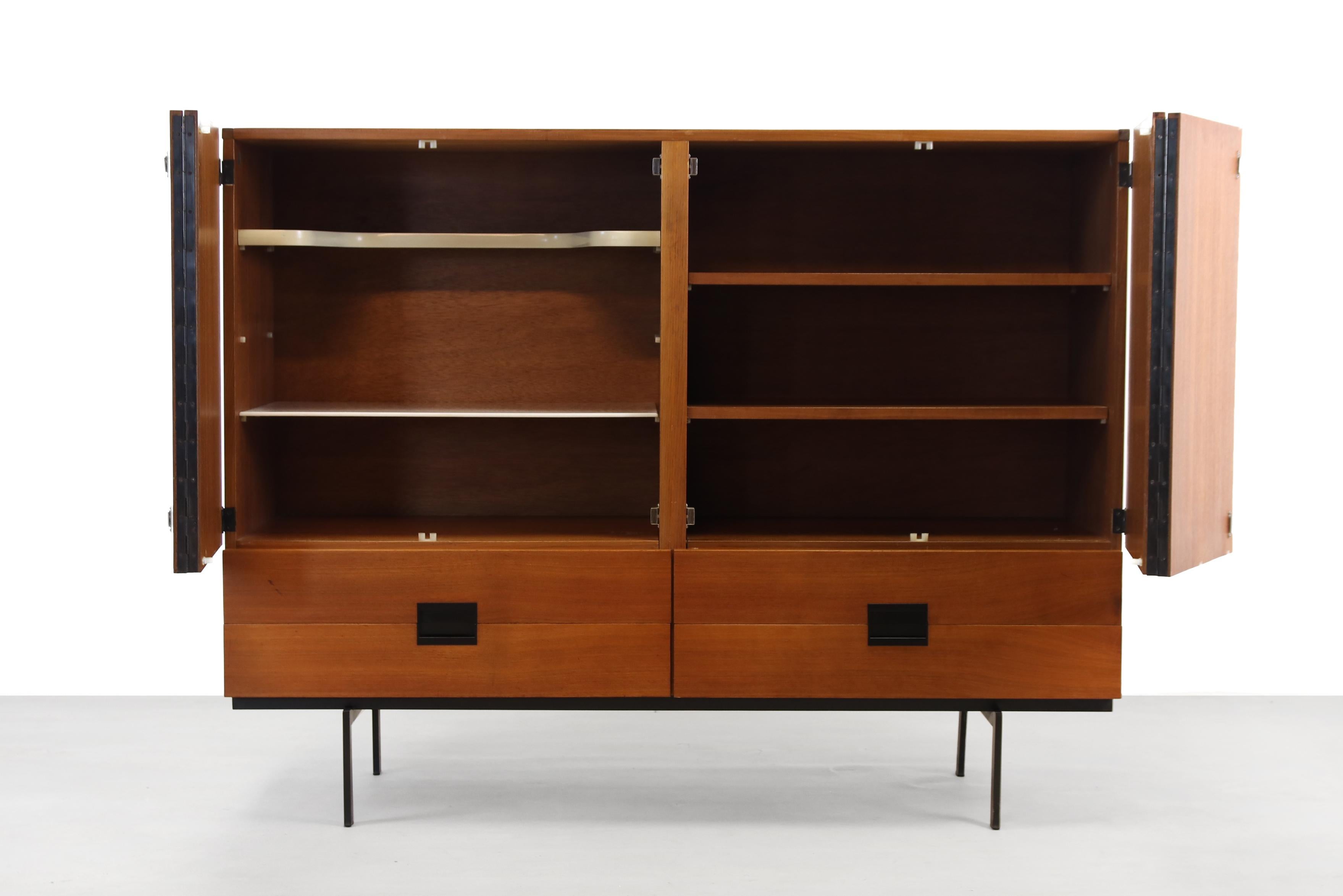 Very nice cabinet from the Japanese series by Cees Braakman manufactured by Pastoe. This cabinet is not only beautiful but also offers a lot of storage space. The teak cabinet has a beautiful drawing and a golden glow in the wood, and the iconic