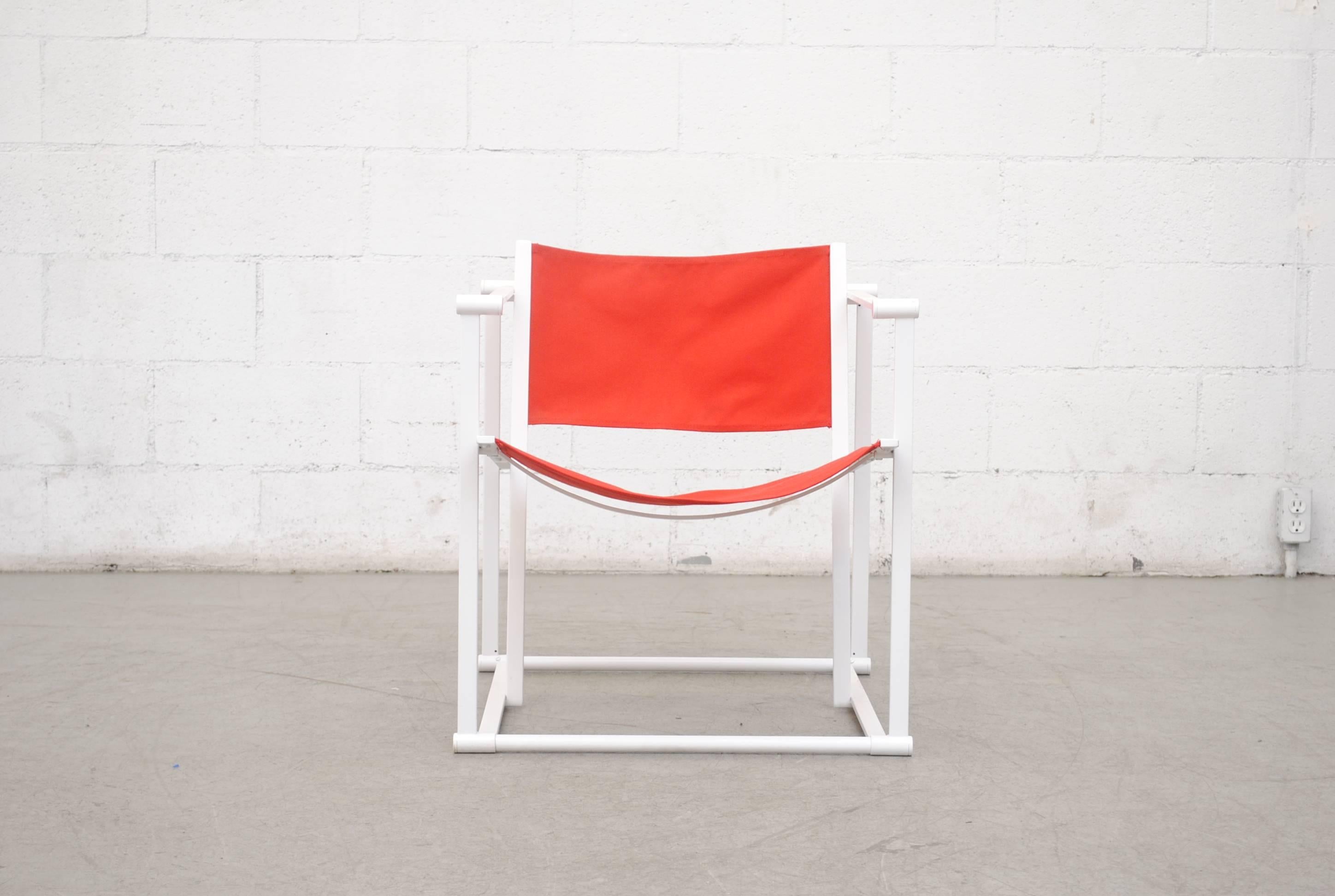 UMS Pastoe FM60, cubic chair lounge chair, designed in 1980 by Radboud Van Beekum. White Enameled steel frame with newly upholstered red/orange canvas seating. Frame is in original condition with slight wear to enamel.