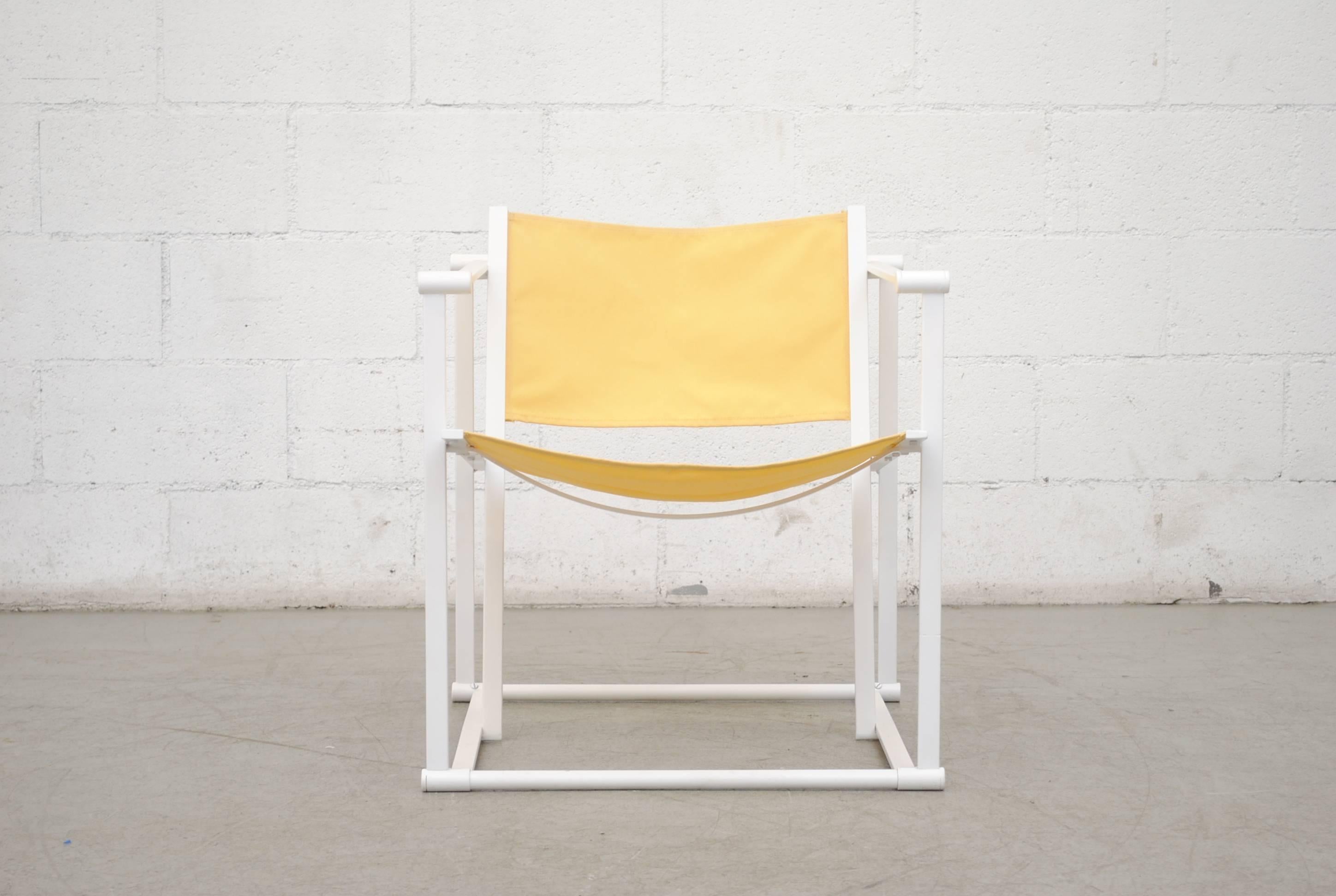 UMS Pastoe FM60, cubic chair lounge chair, designed in 1980 by Radboud van Beekum. White enameled steel frame with newly upholstered yellow canvas seating. Frame is in original condition with some wear to enamel.