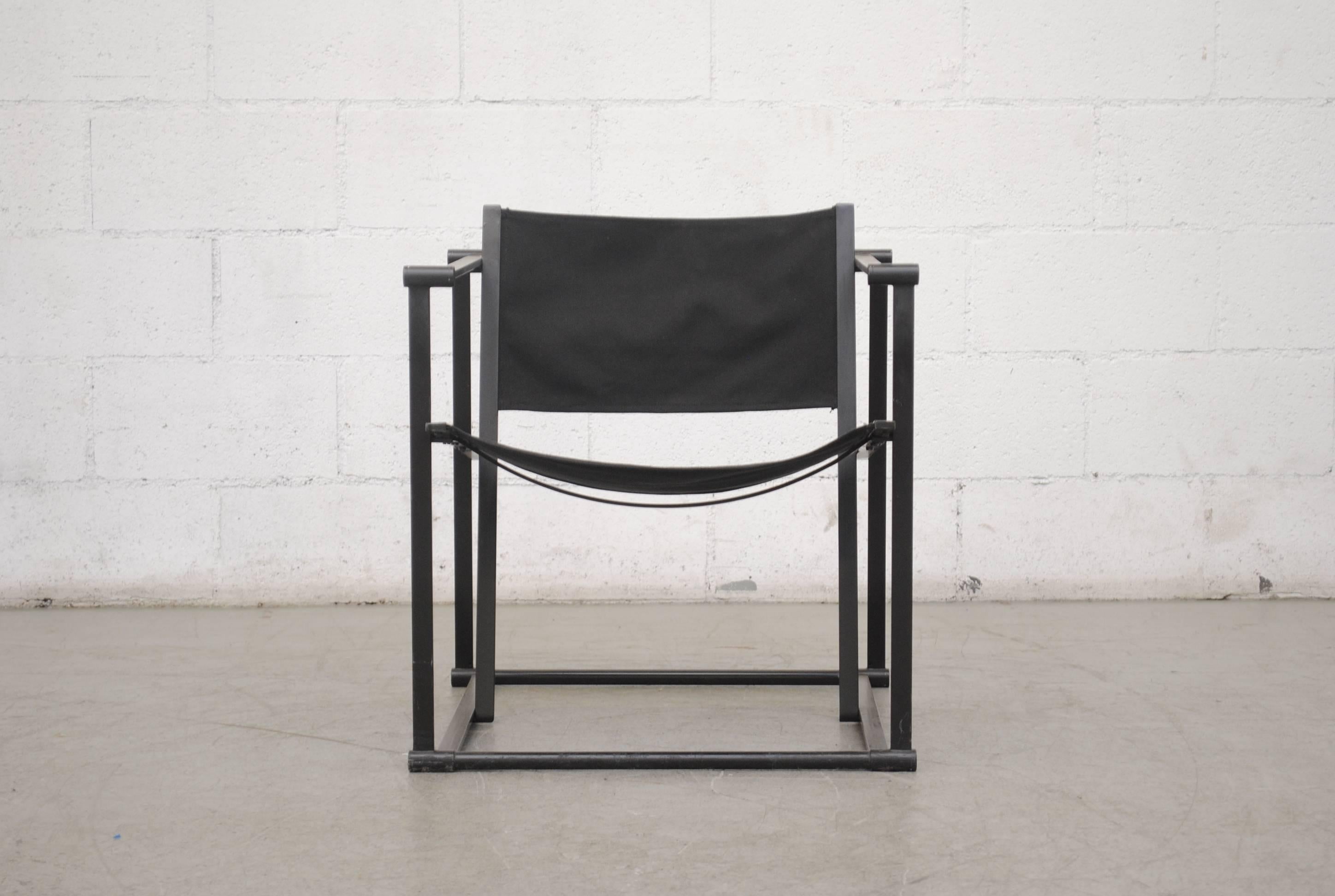 UMS Pastoe FM60, Cubic Lounge Chair, designed in 1980 by Radboud van Beekum. Black Enameled Steel Frame with Original Black Canvas Seating. Frame is in Original Condition with Some Wear to Enamel.