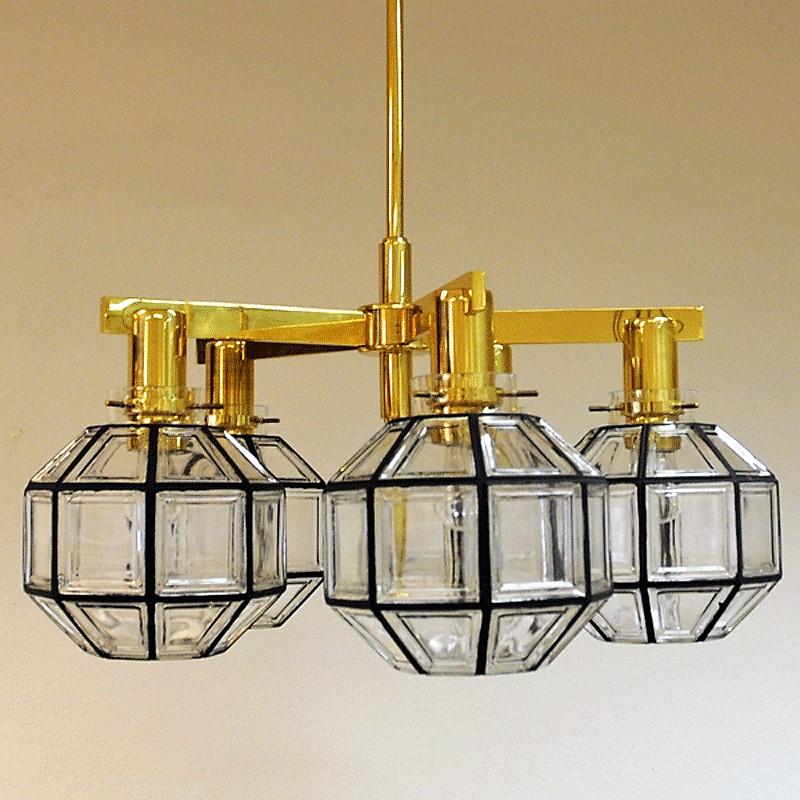 Very special five-armed Pastoral ceiling lamp model T348/5D produced in 1959. The lamp has original hand-painted and original clear cast crystal ware glass shades. Designed by Hans-Agne Jakobsson for Markaryd, Sweden.
The glass domes are eight-edge