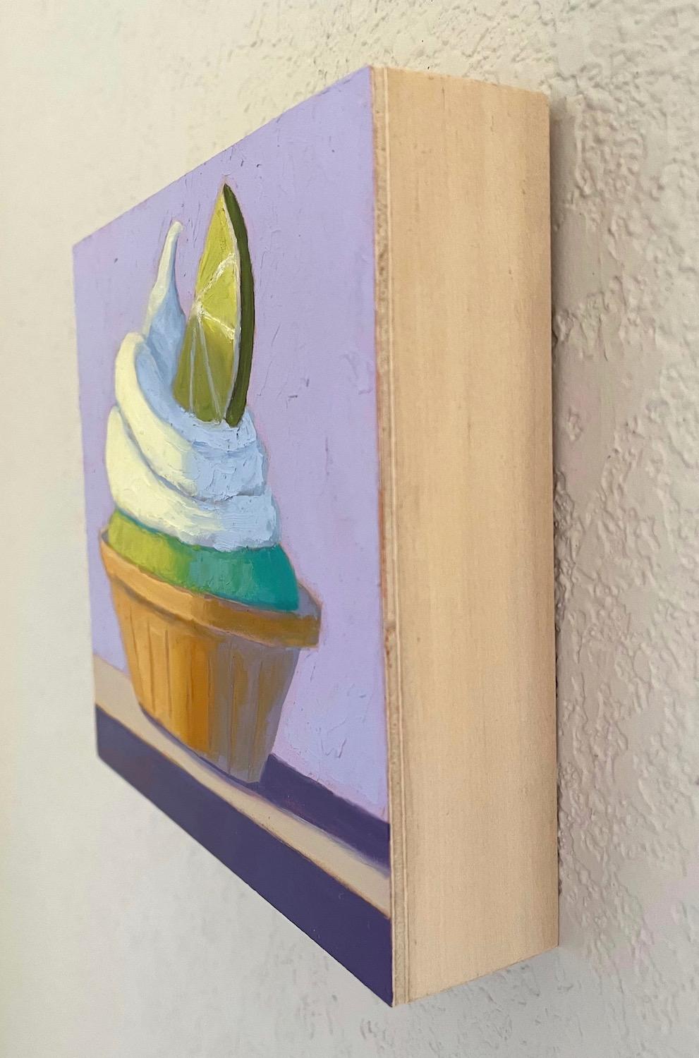 <p>Artist Comments<br>A lime tart with a whipped cream topping and a lime wedge serves as a delightful treat in this still-life painting. Soft visual texture extends from the dessert to the purple background. The artwork features a balance between