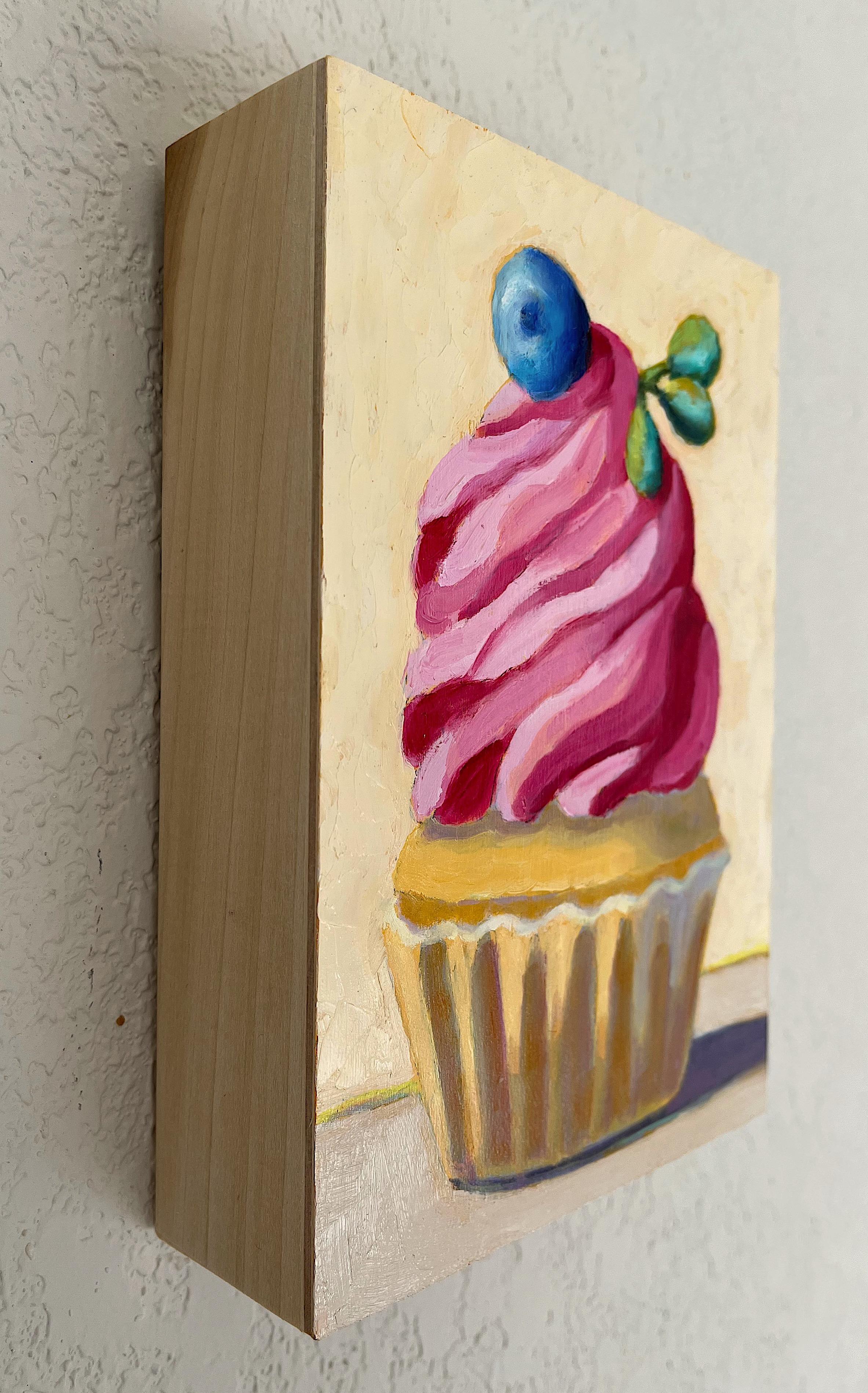 <p>Artist Comments<br>A raspberry swirl cupcake, topped with mint and blueberry, serves as a creamy delight in this still-life painting. The vibrant frosting and garnish stand out against the beige backdrop. Drawing inspiration from her background