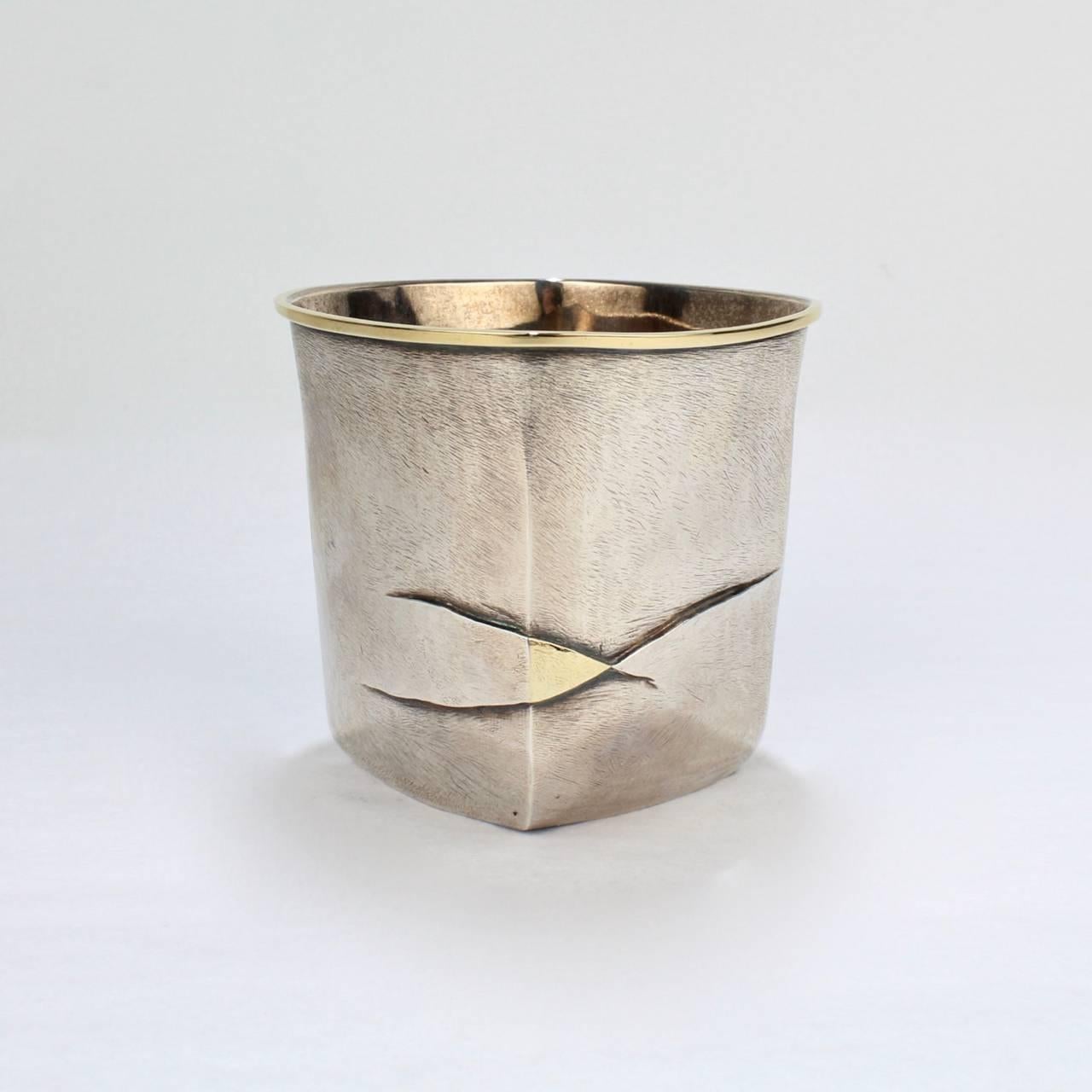 An exceptional Pat Flynn mixed metals beaker or drinking vessel in sterling silver and 18K gold.

Simply breathtaking metal-smithing from a major American craftsman, whose work is in major institutions and collections.

With an etched signature,